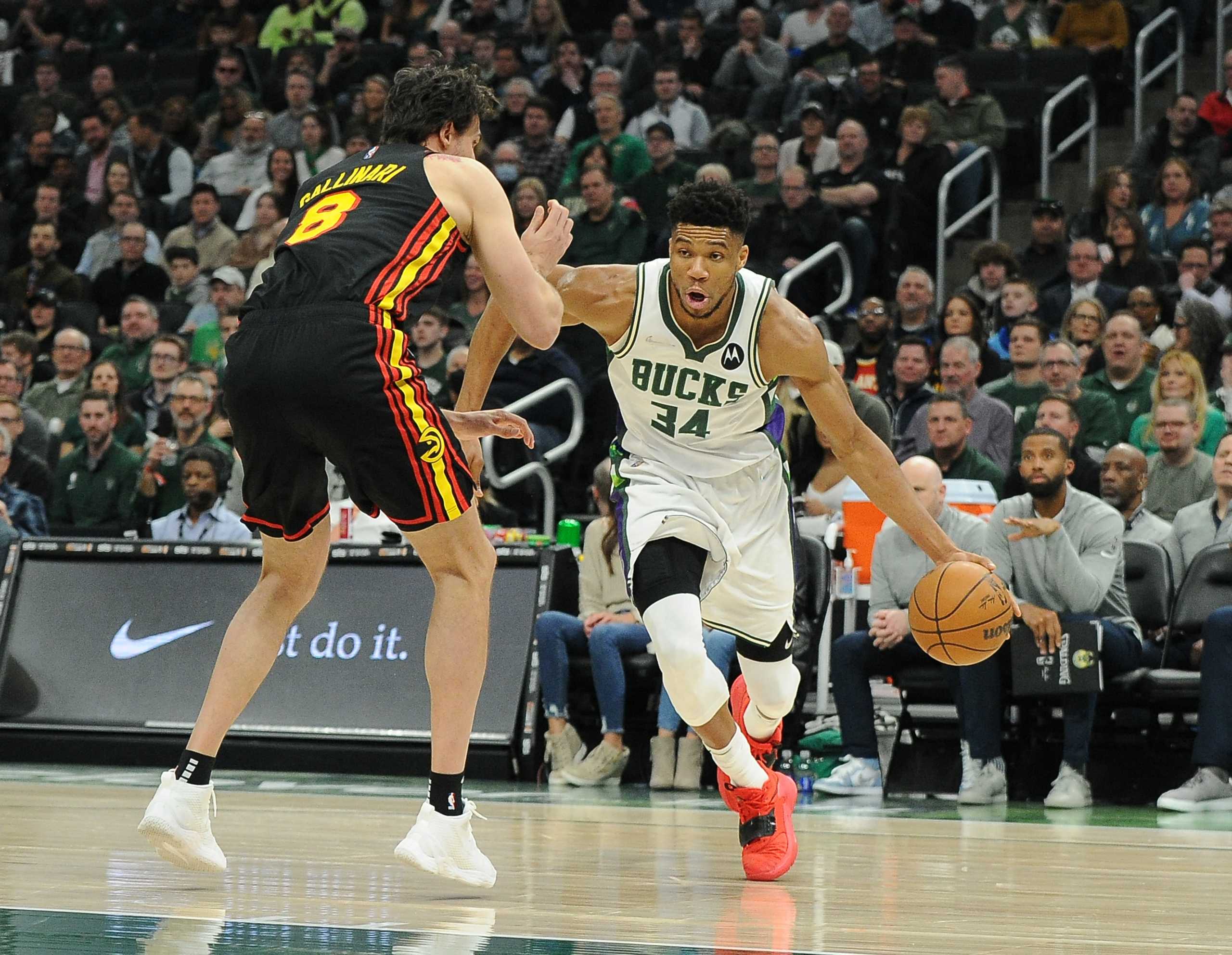 Mar 9, 2022; Milwaukee, Wisconsin, USA;  Milwaukee Bucks forward Giannis Antetokounmpo (34) drives to the basket against Atlanta Hawks forward Danilo Gallinari (8) in the first half at Fiserv Forum. Mandatory Credit: Michael McLoone-USA TODAY Sports
