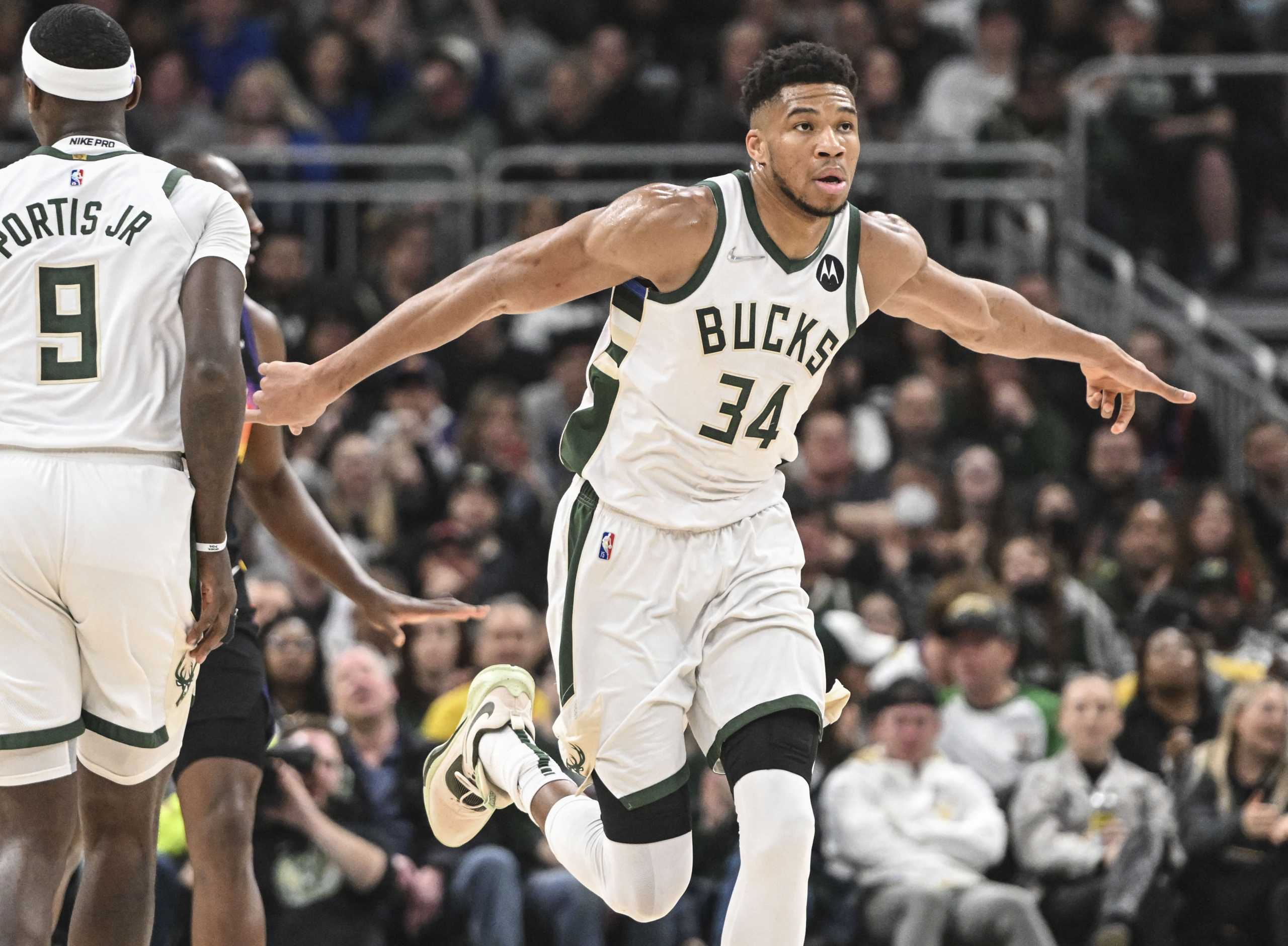 Mar 6, 2022; Milwaukee, Wisconsin, USA;  Milwaukee Bucks forward Giannis Antetokounmpo (34) reacts in the second quarter after scoring a basket against the Phoenix Suns at Fiserv Forum. Mandatory Credit: Benny Sieu-USA TODAY Sports