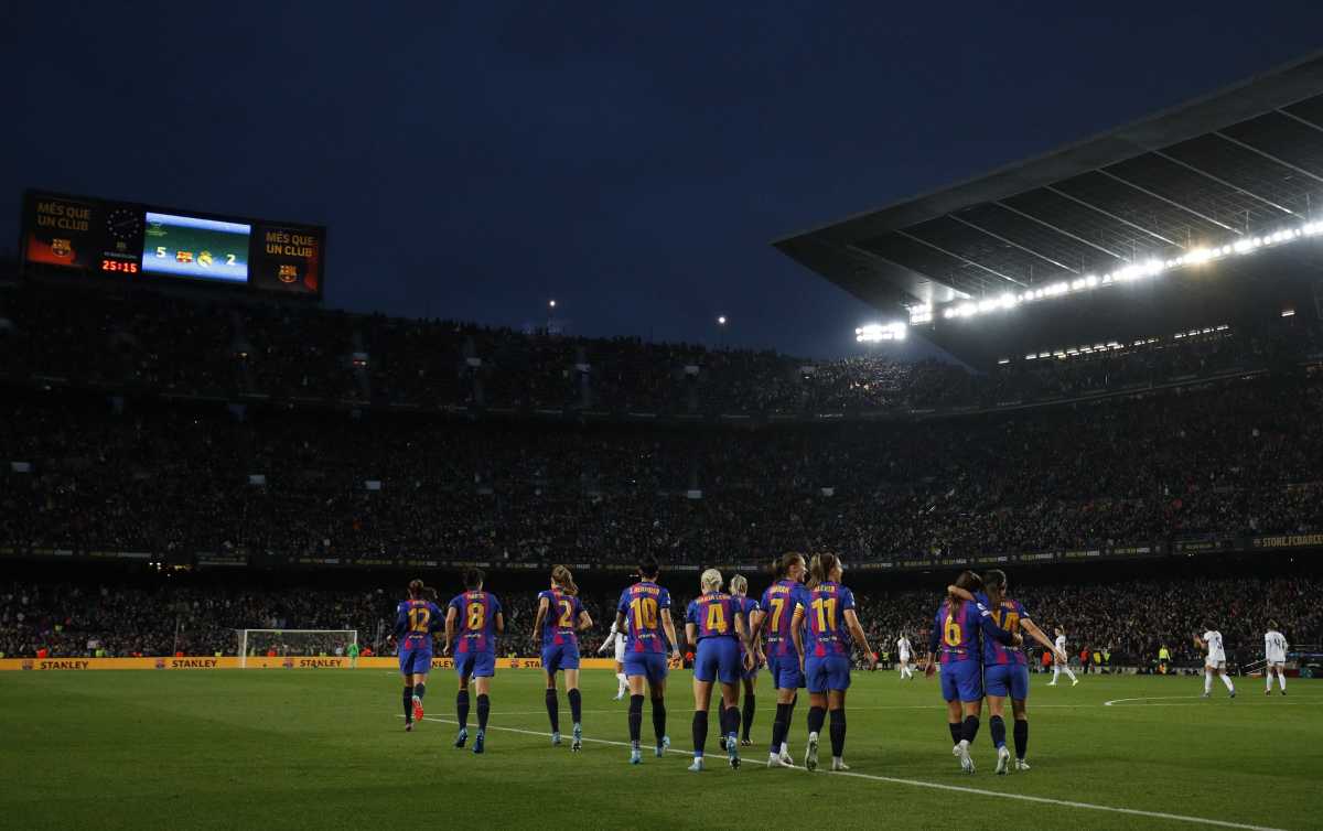 Soccer Football - Women's Champions League - Quarter Final - Second Leg - FC Barcelona v Real Madrid - Camp Nou, Barcelona, Spain - March 30, 2022 FC Barcelona's Caroline Hansen celebrates scoring their fifth goal with teammates REUTERS