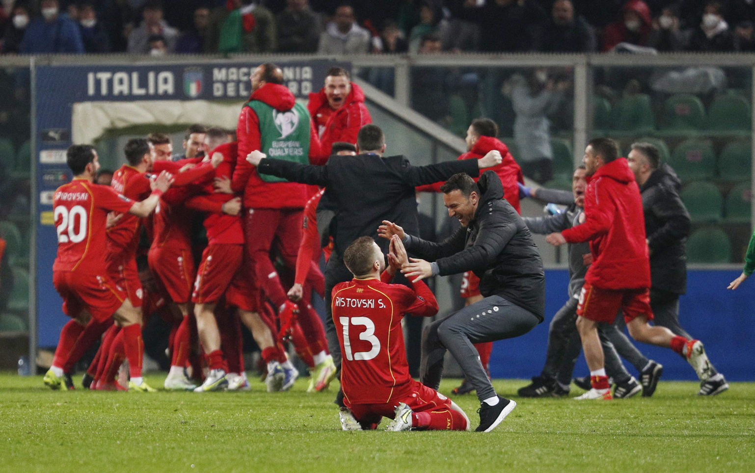 Soccer Football - World Cup - UEFA Qualifiers - Play-Off Semi Final - Italy v North Macedonia - Stadio Renzo Barbera, Palermo, Italy - March 24, 2022 North Macedonia's Stefan Ristovski celebrates with teammates after the match REUTERS