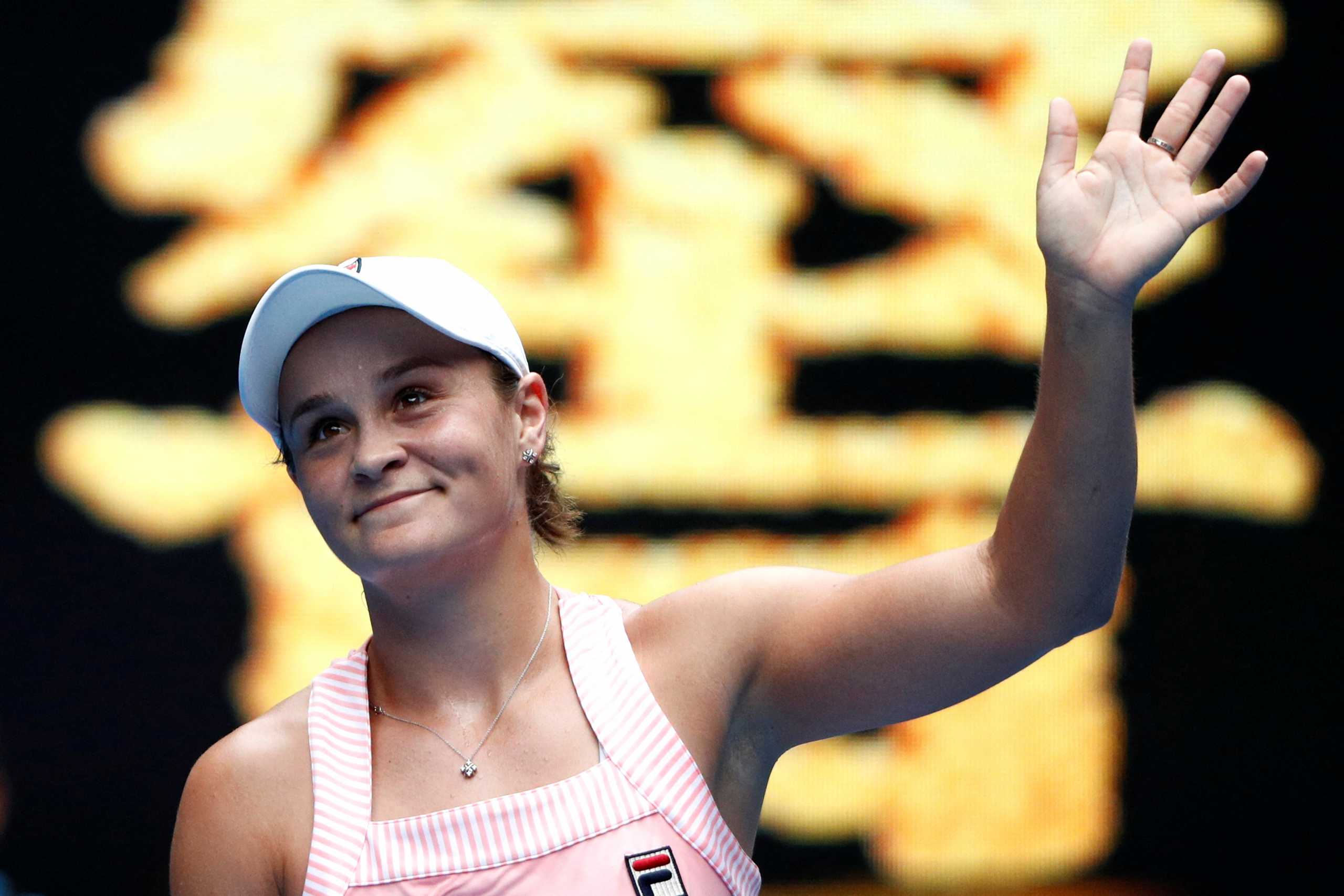 FILE PHOTO: Tennis - Australian Open - Second Round - Melbourne Park, Melbourne, Australia, January 16, 2019.  Australia's Ashleigh Barty waves to spectators after winning the match against China's Wang Yafan. REUTERS