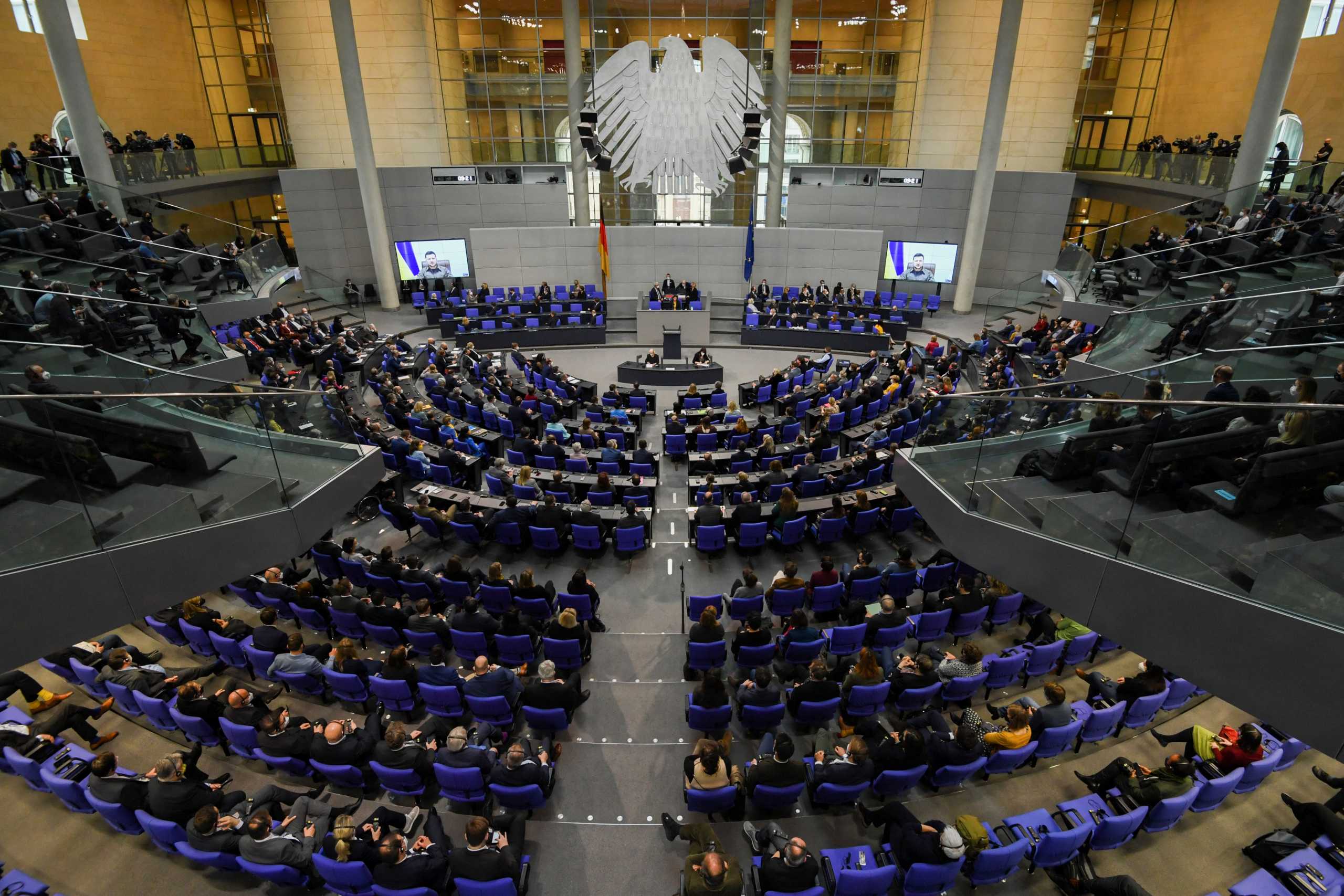 Ukraine's President Volodymyr Zelenskiy addresses Germany's lower house of parliament, the Bundestag, via videolink, after Russia's invasion of Ukraine, in Berlin, Germany, March 17, 2022. REUTERS