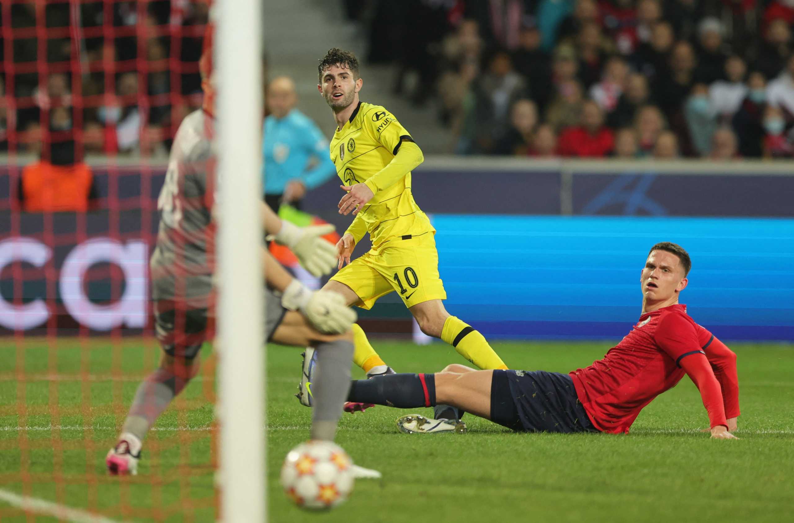 Soccer Football - Champions League - Lille v Chelsea - Stade Pierre-Mauroy, Villeneuve-d'Ascq, France - March 16, 2022 Chelsea's Christian Pulisic scores their first goal REUTERS