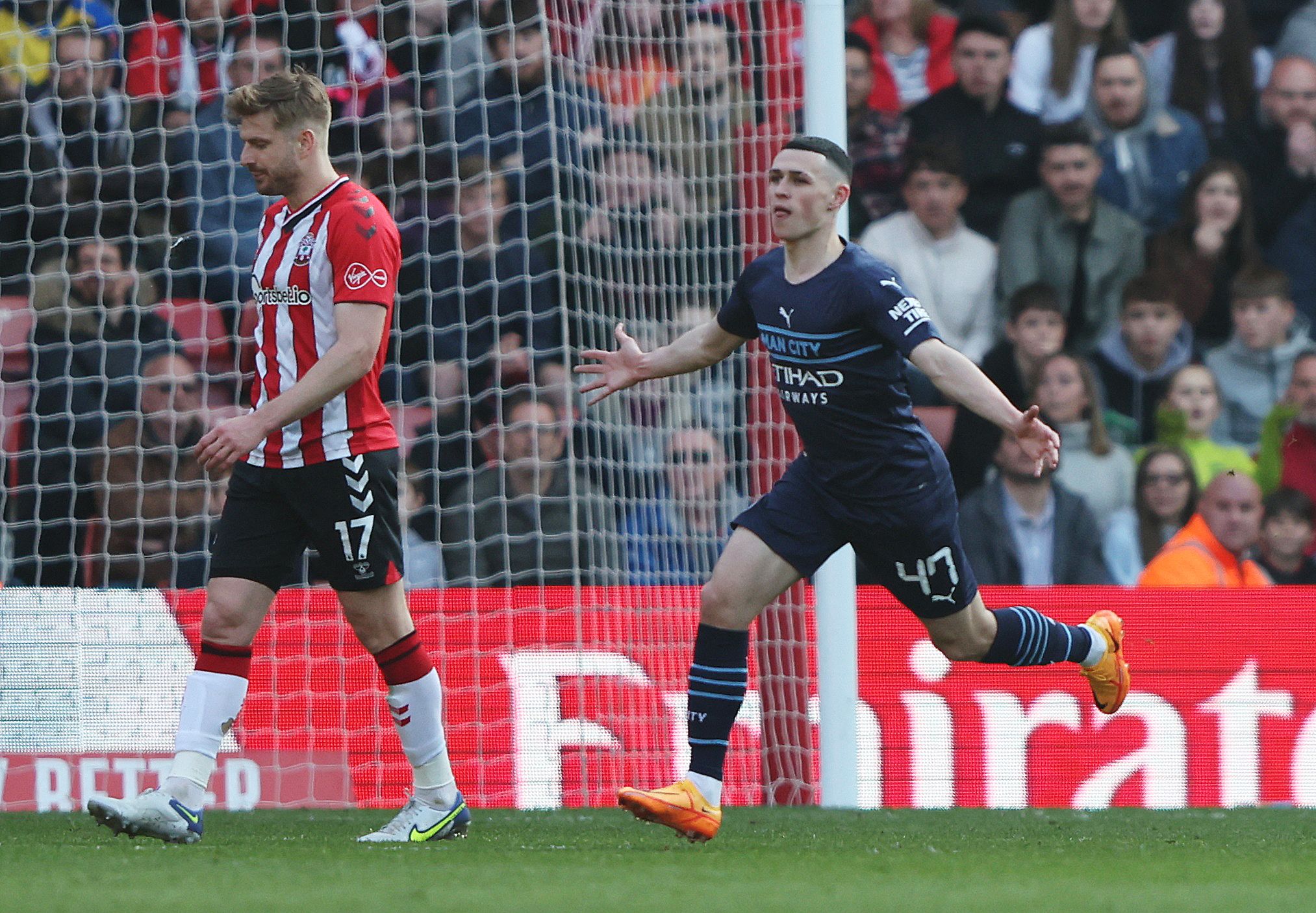 Soccer Football - FA Cup Quarter Final - Southampton v Manchester City - St Mary's Stadium, Southampton, Britain - March 20, 2022 Manchester City's Phil Foden celebrates scoring their third goal REUTERS