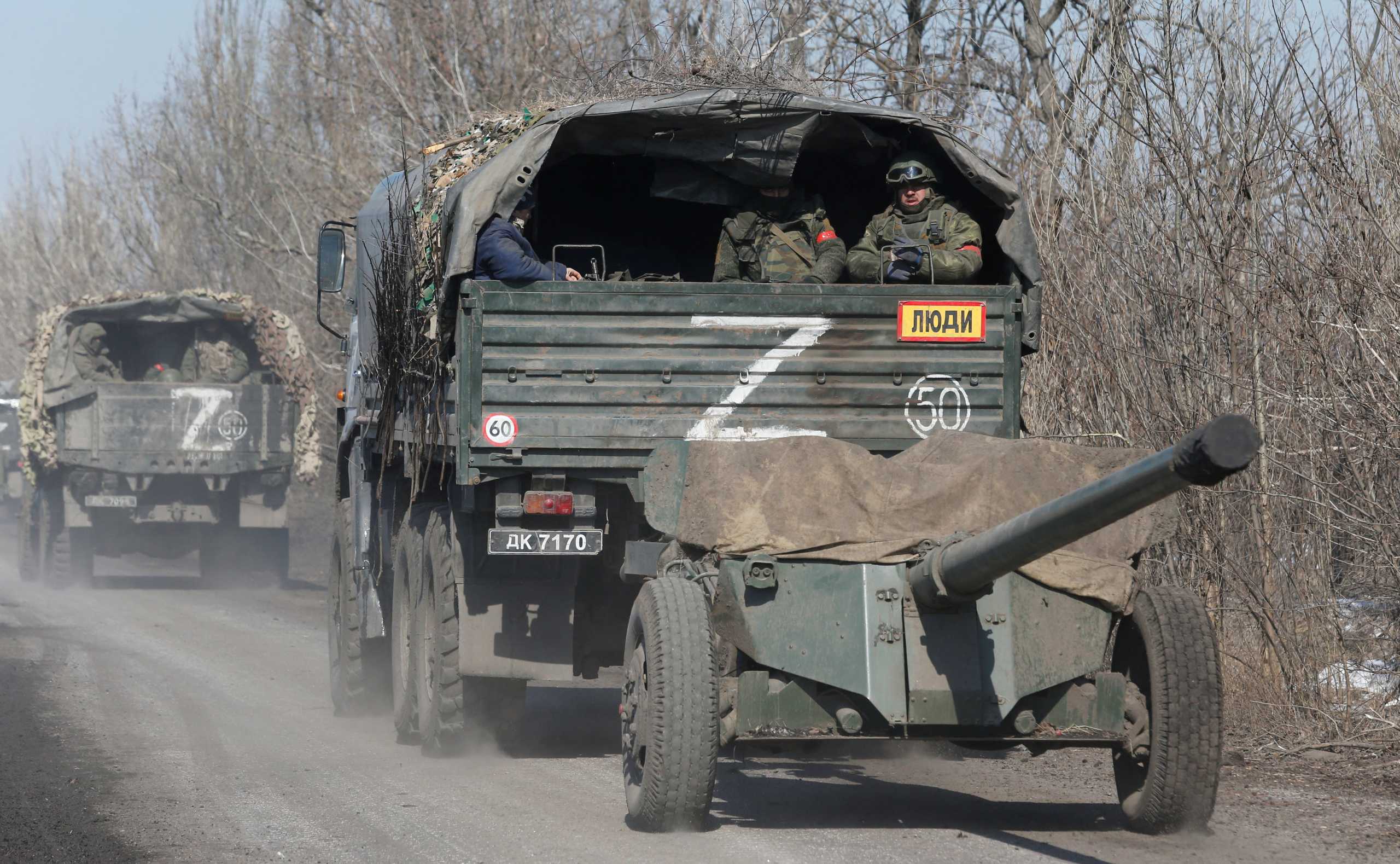 A view shows a convoy of pro-Russian troops during Ukraine-Russia conflict outside the separatist-controlled town of Volnovakha in the Donetsk region, Ukraine March 12, 2022. REUTERS