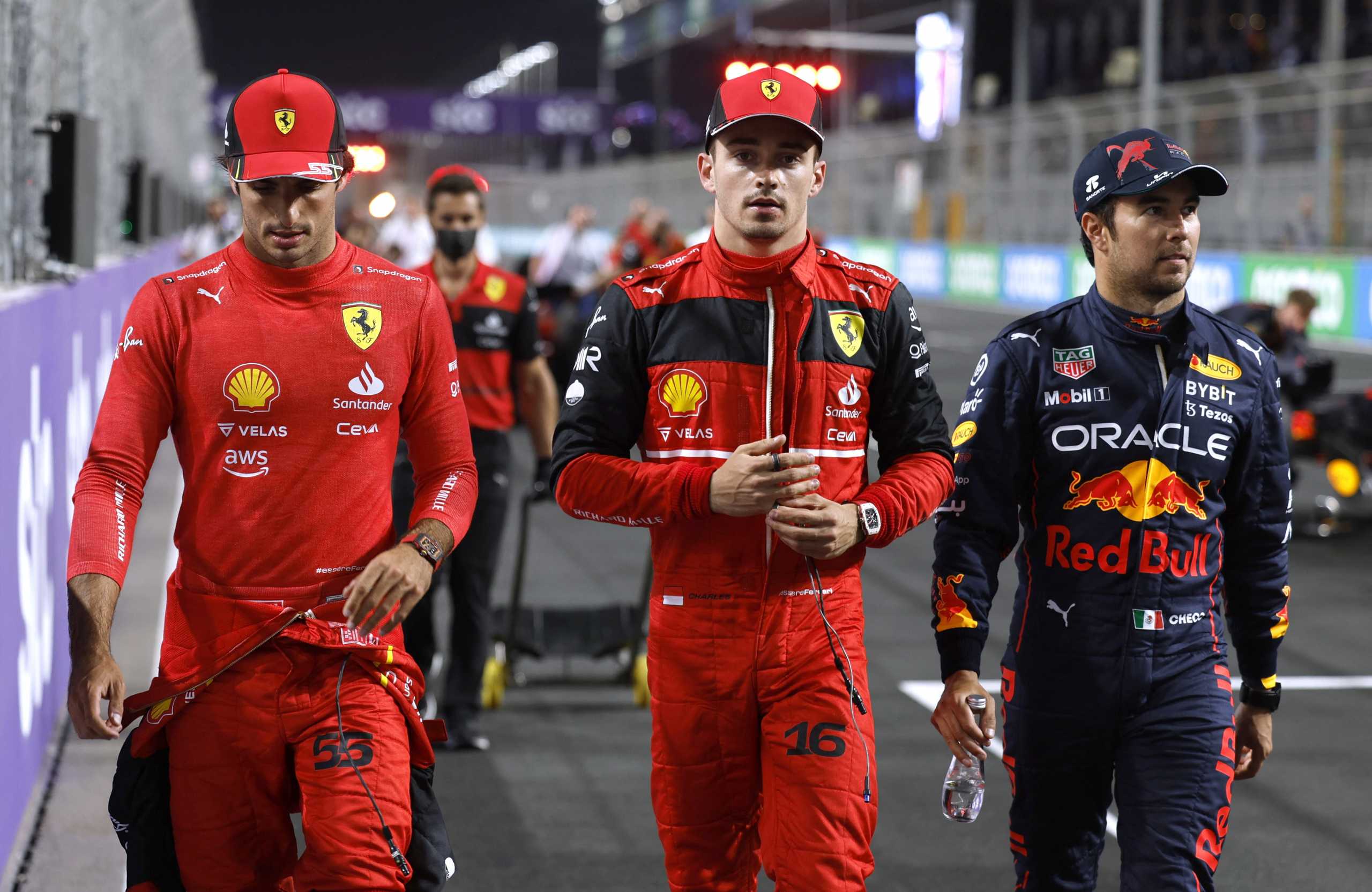 Formula One F1 - Saudi Arabia Grand Prix - Jeddah Corniche Circuit, Jeddah, Saudi Arabia - March 26, 2022  First placed Red Bull's Sergio Perez with second placed Ferrari's Charles Leclerc and third placed Ferrari's Carlos Sainz Jr. after qualifying REUTERS