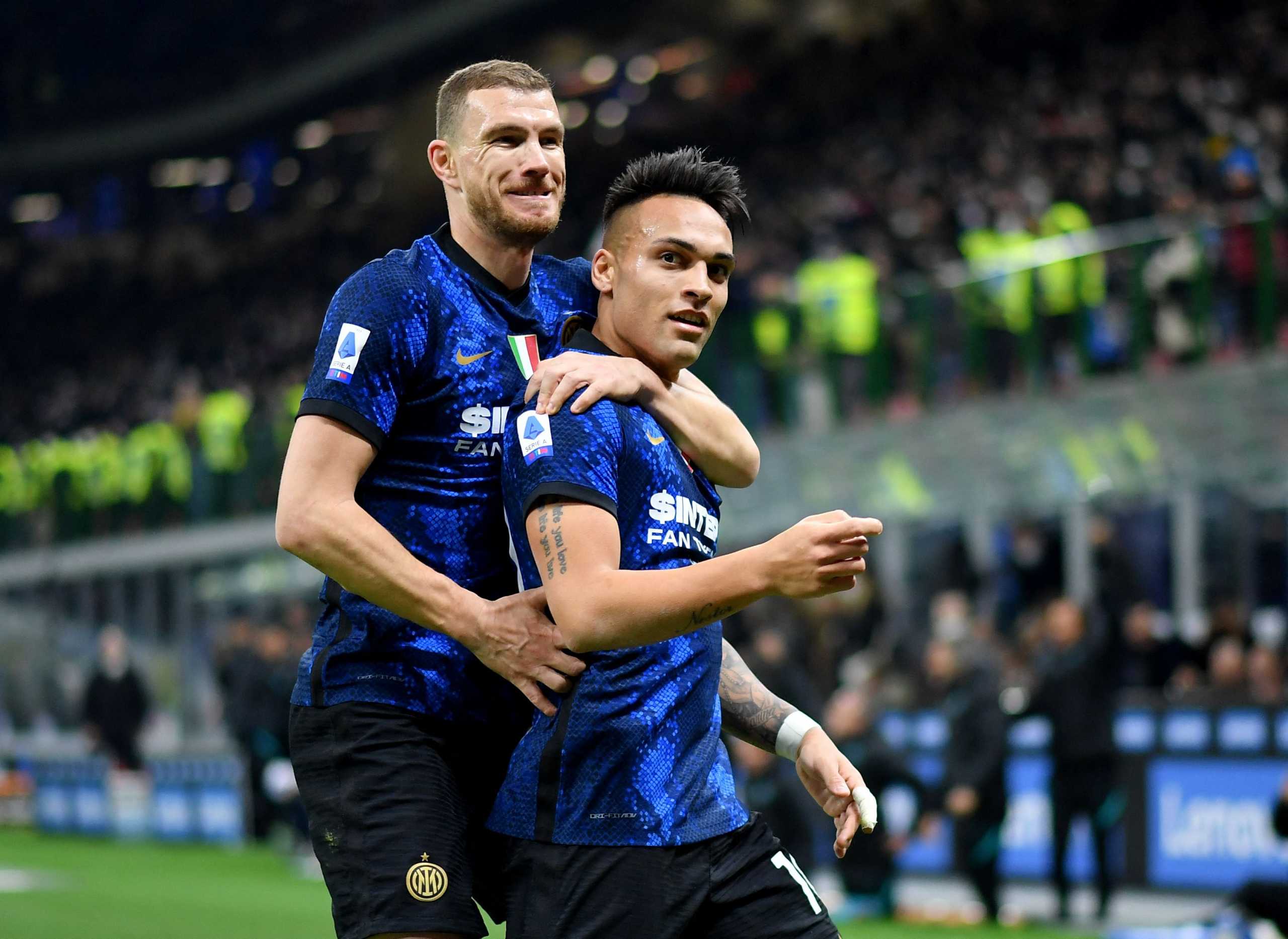 Soccer Football - Serie A - Inter Milan v Salernitana - San Siro, Milan, Italy - March 4, 2022 Inter Milan's Lautaro Martinez celebrates scoring their second goal with Edin Dzeko REUTERS