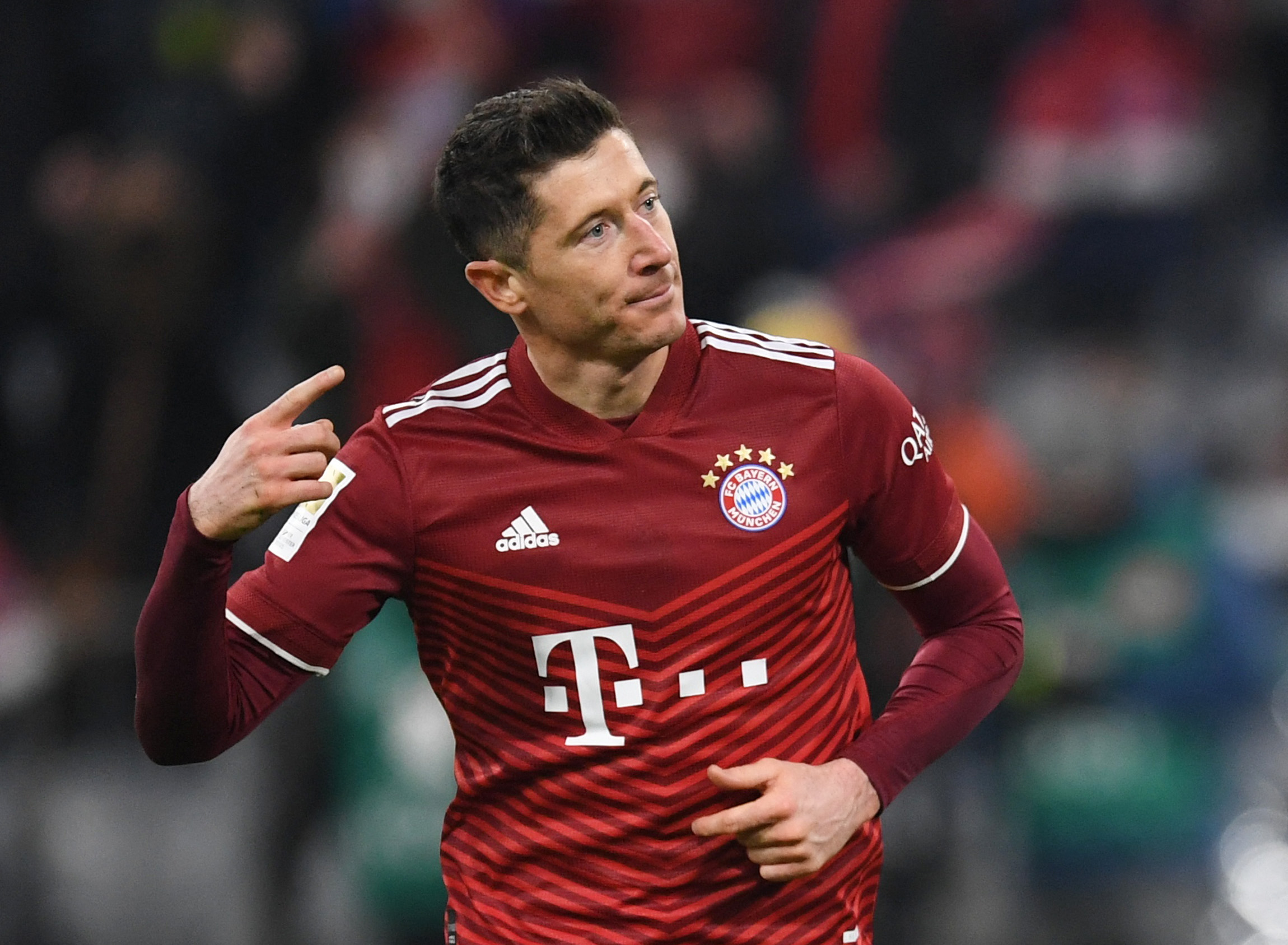 Soccer Football - Bundesliga - Bayern Munich v 1. FC Union Berlin - Allianz Arena, Munich, Germany - March 19, 2022 Bayern Munich's Robert Lewandowski celebrates scoring their third goal REUTERS