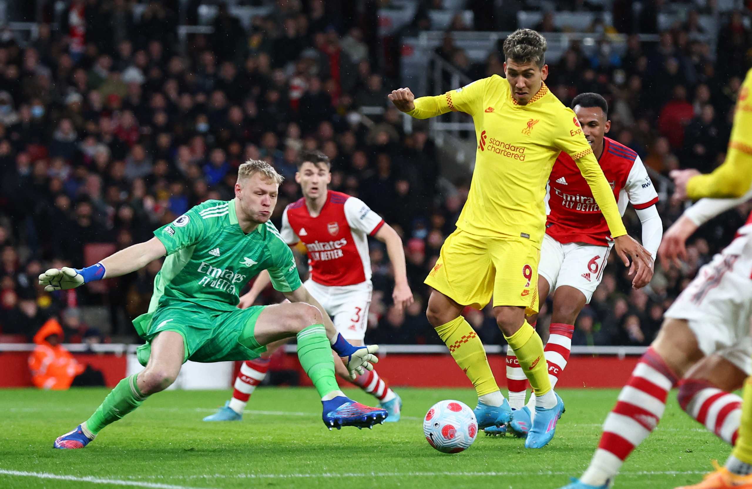 Soccer Football - Premier League - Arsenal v Liverpool - Emirates Stadium, London, Britain - March 16, 2022 Liverpool's Roberto Firmino scores their second goal REUTERS