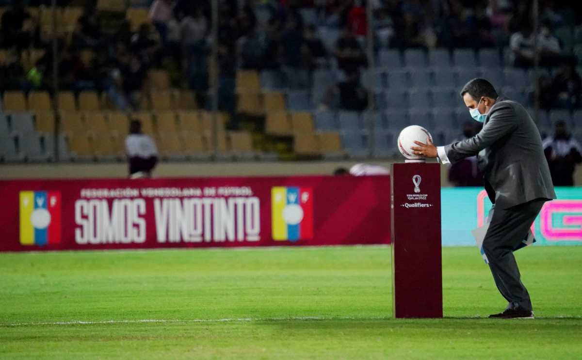 Soccer Football - World Cup - South American Qualifiers - Venezuela v Colombia - Estadio Cachamay, Ciudad Guayana, Venezuela - March 29, 2022 A staff member with the match ball before the match REUTERS