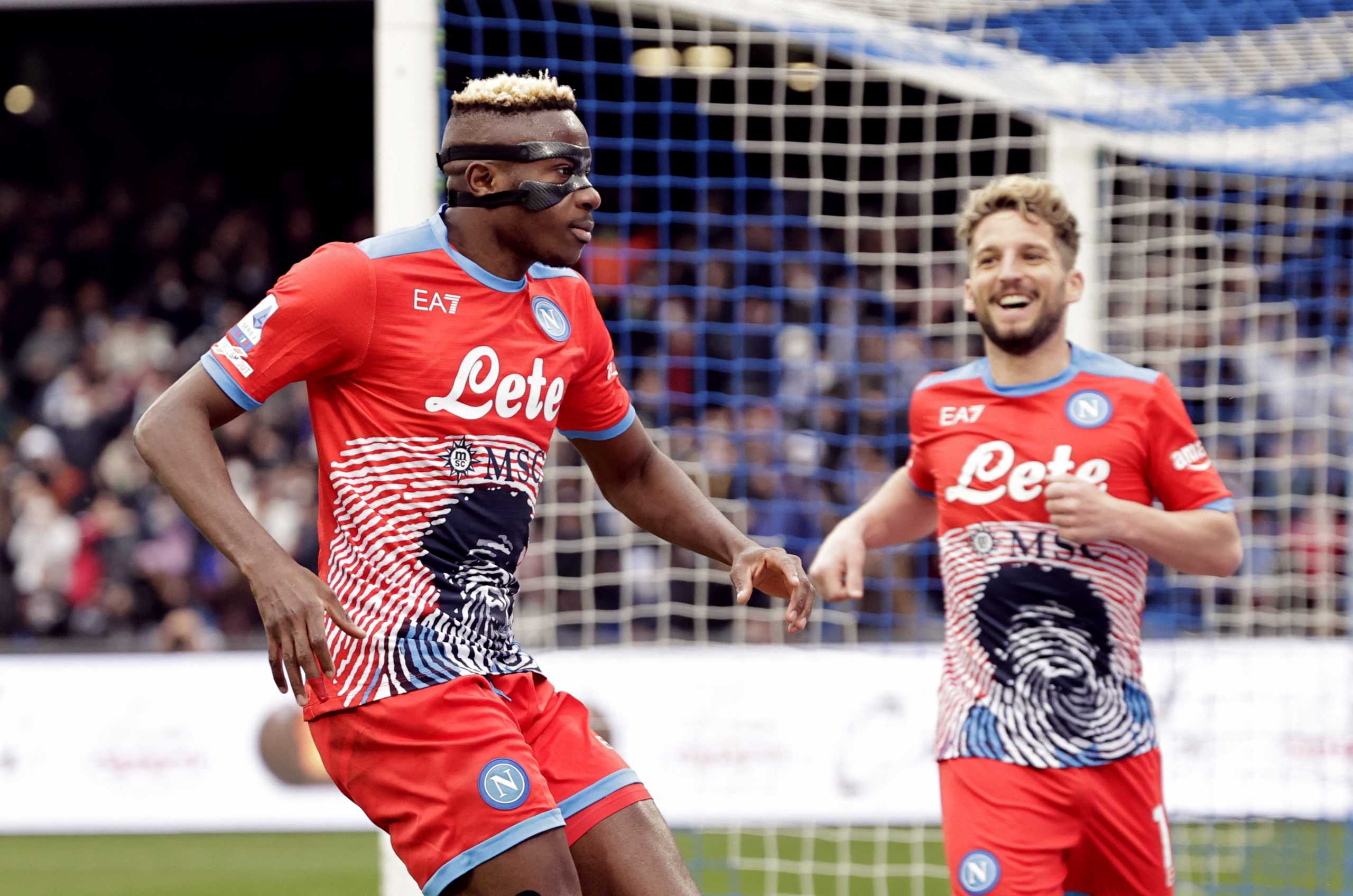 Soccer Football - Serie A - Napoli v Udinese - Stadio Diego Armando Maradona, Naples, Italy - March 19, 2022 Napoli's Victor Osimhen celebrates scoring their second goal with Dries Mertens REUTERS