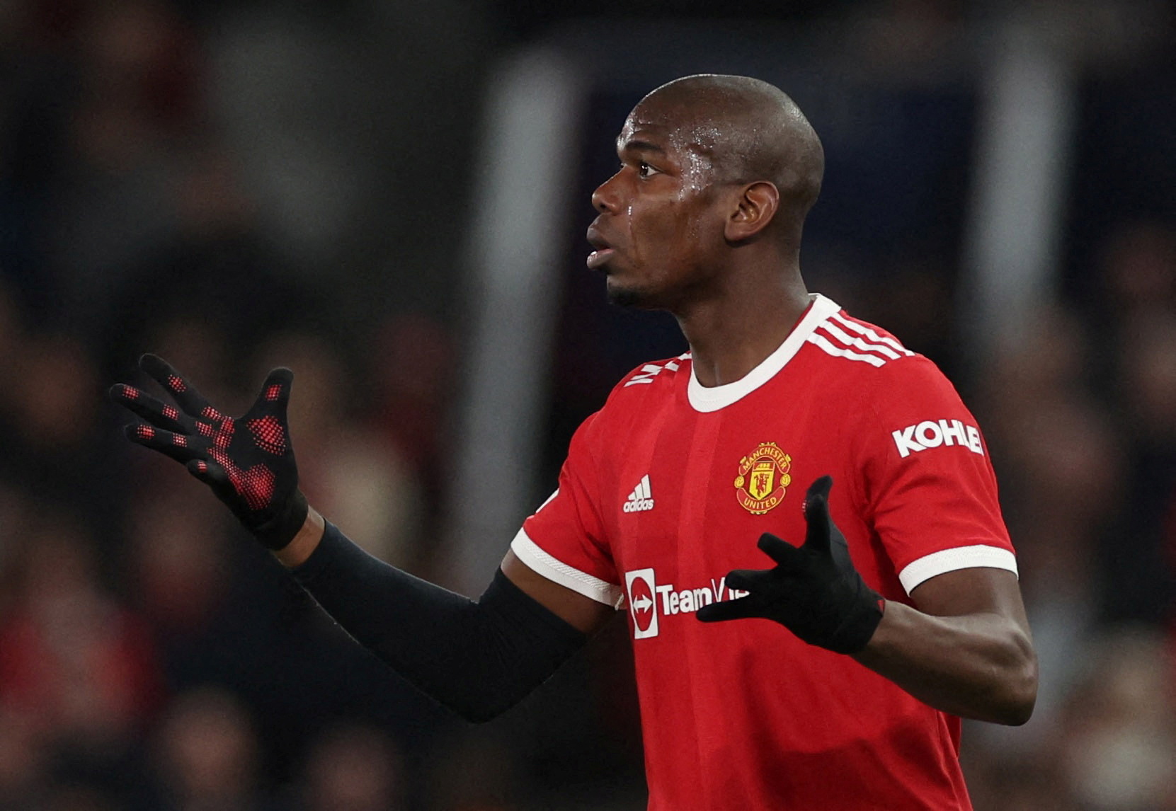 FILE PHOTO: Soccer Football - Champions League - Round of 16 Second Leg - Manchester United v Atletico Madrid - Old Trafford, Manchester, Britain - March 15, 2022 Manchester United's Paul Pogba reacts REUTERS