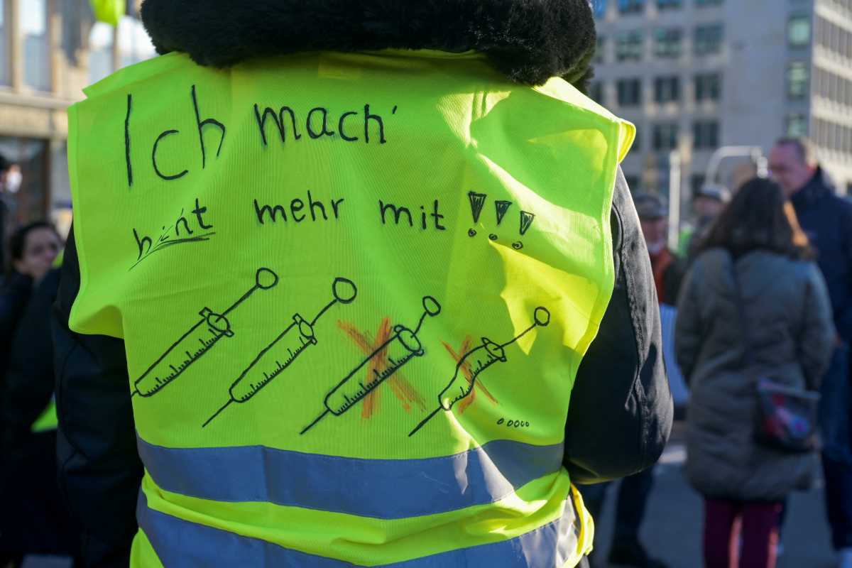 A demonstrator wears a high-visibility jacket during a protest against the government's measures to curb the spread of the coronavirus disease (COVID-19), in Hamburg, Germany, March 12, 2022. The jacket reads: 'I'm not participating anymore!' REUTERS