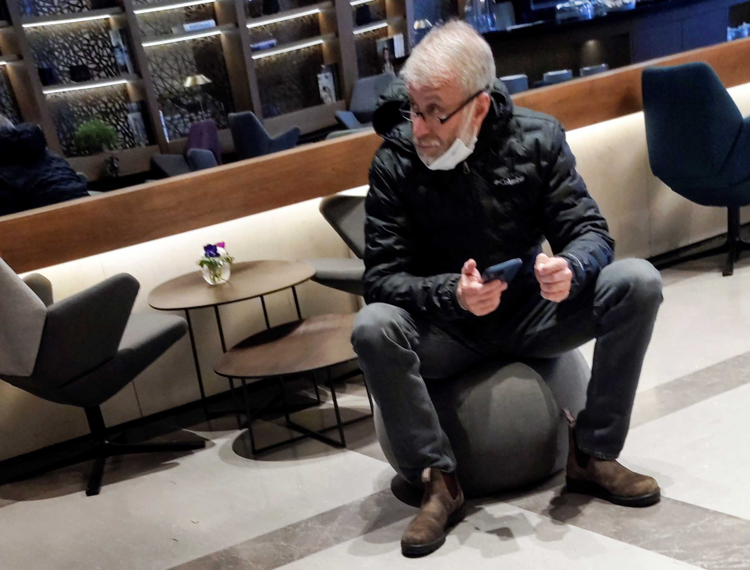 Sanctioned Russian oligarch Roman Abramovich sits in a VIP lounge before a jet linked to him took off for Istanbul from Ben Gurion international airport in Lod near Tel Aviv, Israel, March 14, 2022. REUTERS