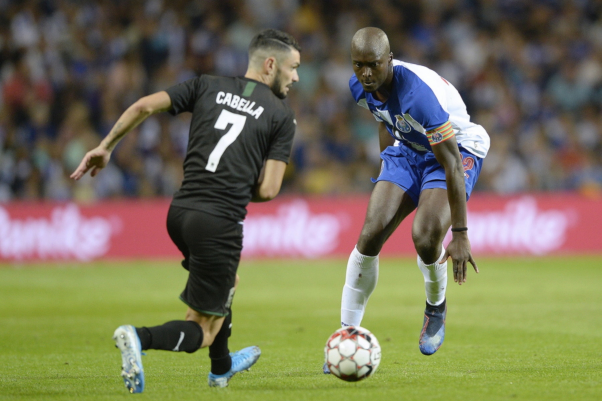 epa07772074 FC Porto's Danilo Pereira (R) vies for the ball with Krasnodar's Remy Cabella during the UEFA Champions League third qualifying round 2nd leg soccer match between FC Porto and FC Krasnodar at Dragao Stadium in Porto, Portugal, 13 August 2019.  EPA