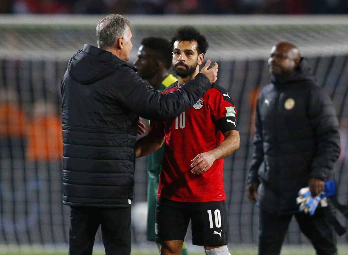 Soccer Football - World Cup - African Qualifiers - Egypt v Senegal - Cairo International Stadium, Cairo, Egypt - March 25, 2022 Egypt's Mohamed Salah celebrates with coach Carlos Queiroz after the match REUTERS