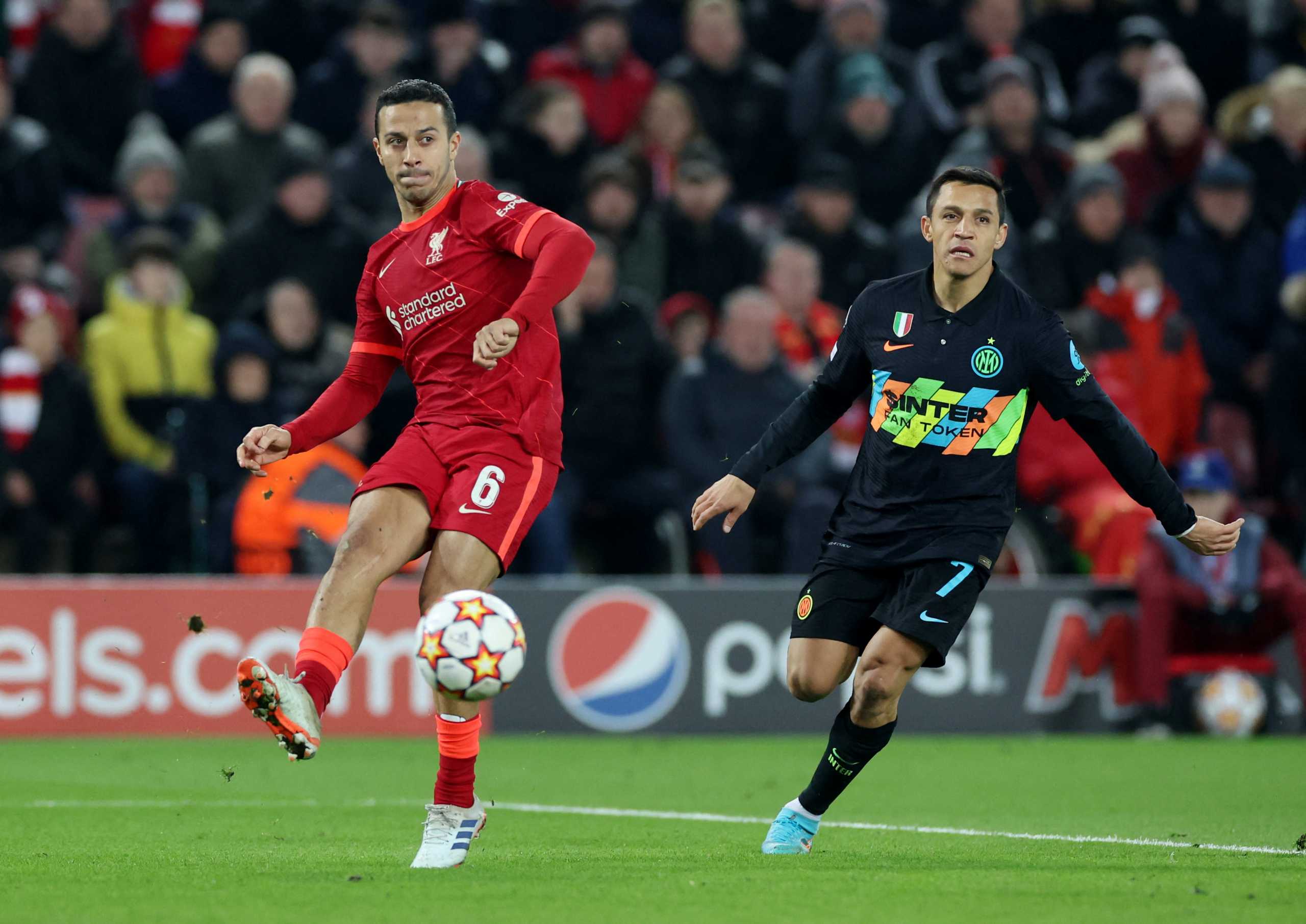 Soccer Football - Champions League - Round of 16 Second Leg - Liverpool v Inter Milan - Anfield, Liverpool, Britain - March 8, 2022 Liverpool's Thiago Alcantara in action with Inter Milan's Alexis Sanchez REUTERS
