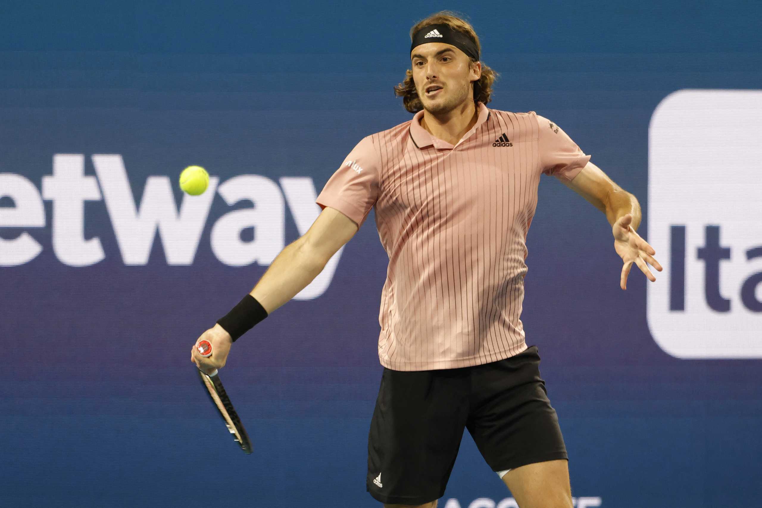 Mar 26, 2022; Miami Gardens, FL, USA; Stefanos Tsitsipas (GRE) hits a forehand against J.J. Wolf (USA)(not pictured) in a second round men's singles match in the Miami Open at Hard Rock Stadium. Mandatory Credit: Geoff Burke-USA TODAY Sports