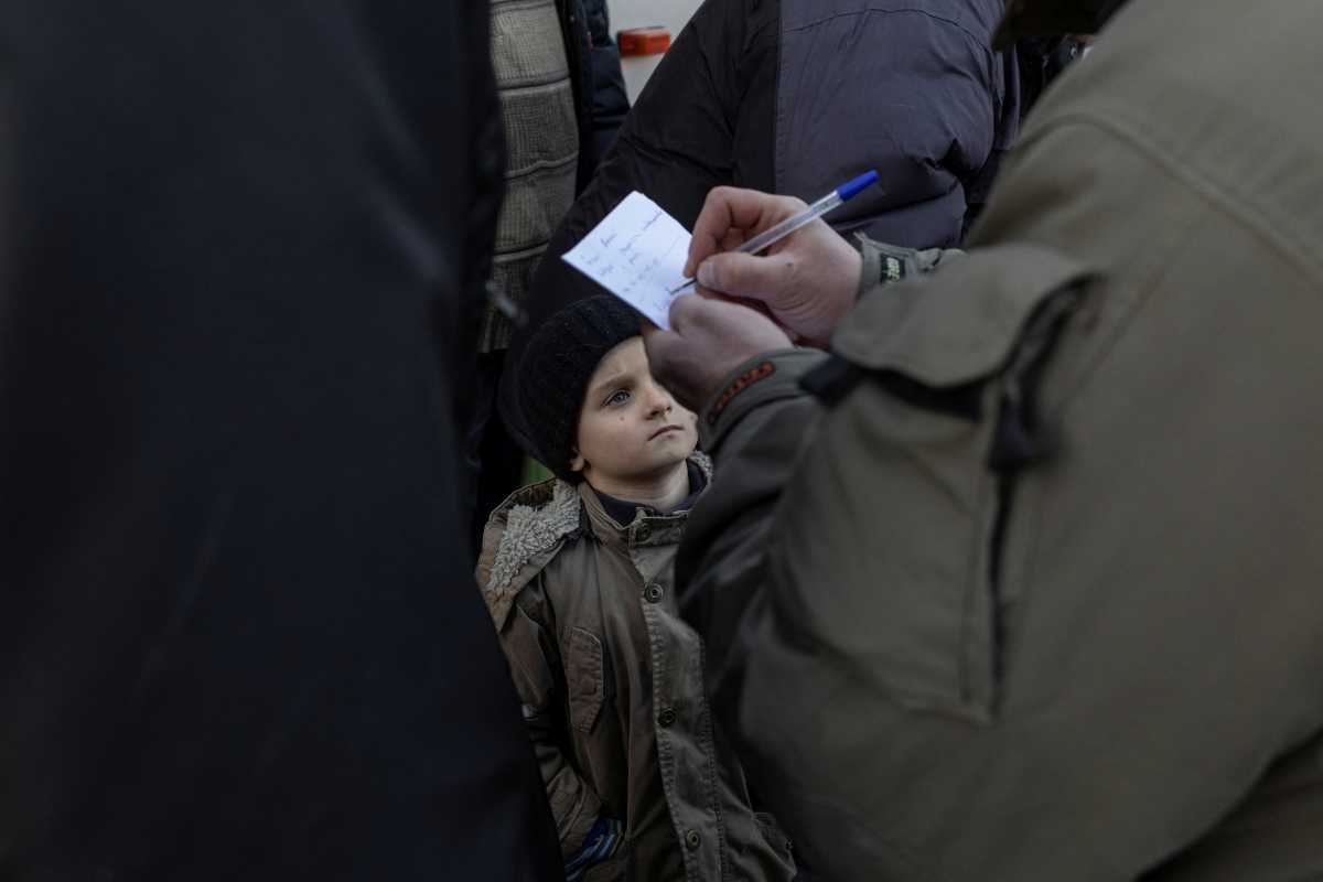 Evacuees from the villages occupied by Russian soldiers arrive in the town of Brovary, amid Russia's invasion of Ukraine, near Kyiv, Ukraine, March 20, 2022. REUTERS