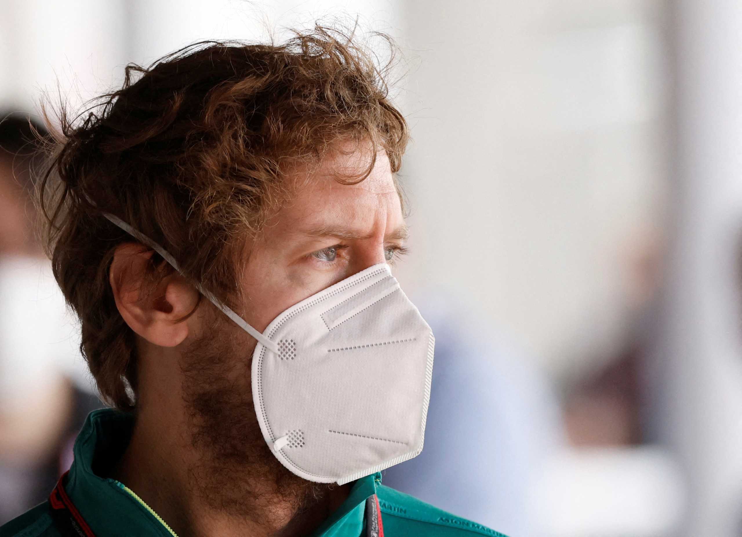 FILE PHOTO: Formula One F1 - Pre-Season Testing - Circuit de Barcelona-Catalunya, Barcelona, Spain - February 24, 2022 Aston Martin's Sebastian Vettel wears a protective face mask during testing REUTERS