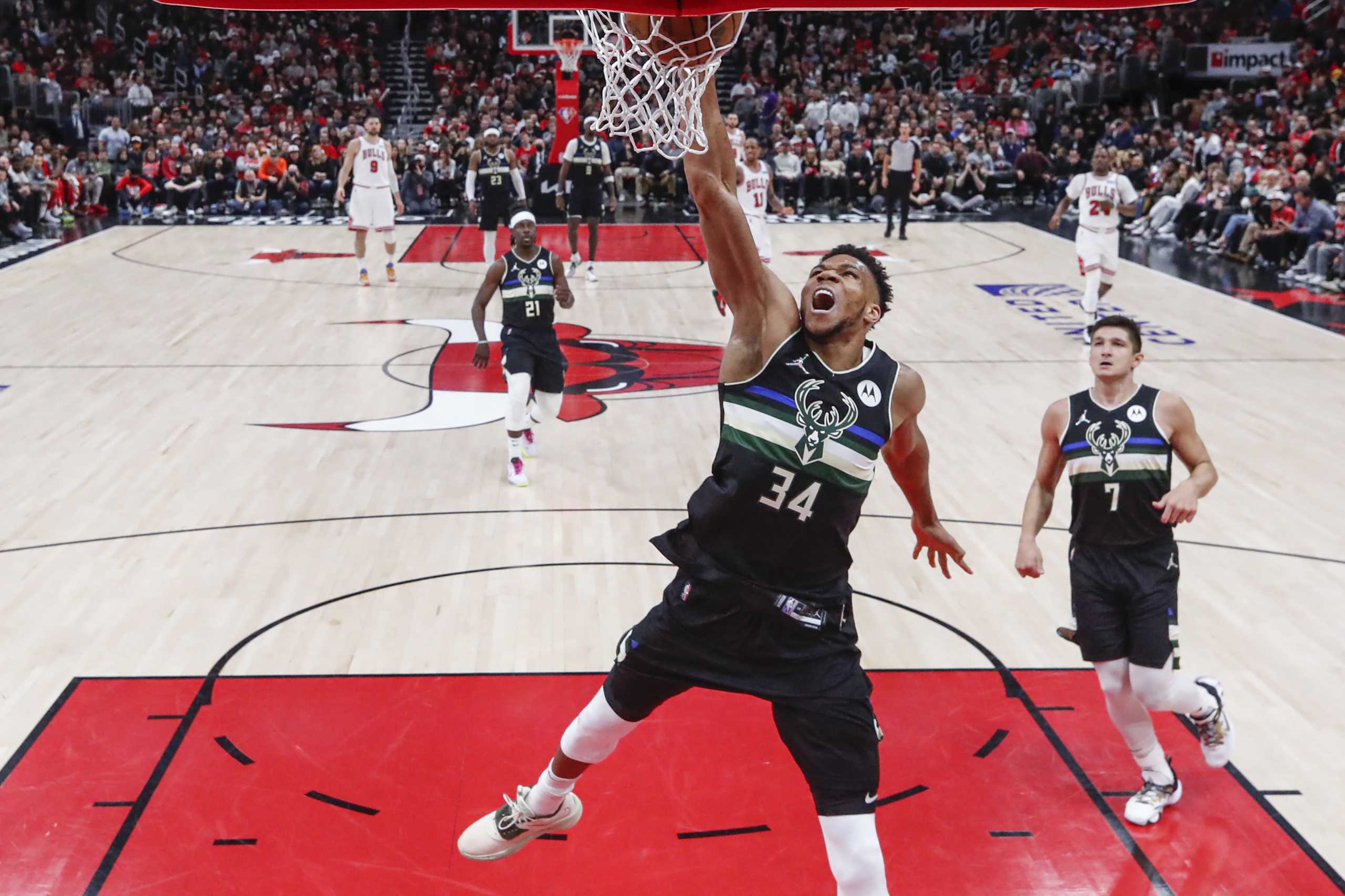 Mar 4, 2022; Chicago, Illinois, USA; Milwaukee Bucks forward Giannis Antetokounmpo (34) dunks the ball against the Chicago Bulls during the second half at United Center. Mandatory Credit: Kamil Krzaczynski-USA TODAY Sports