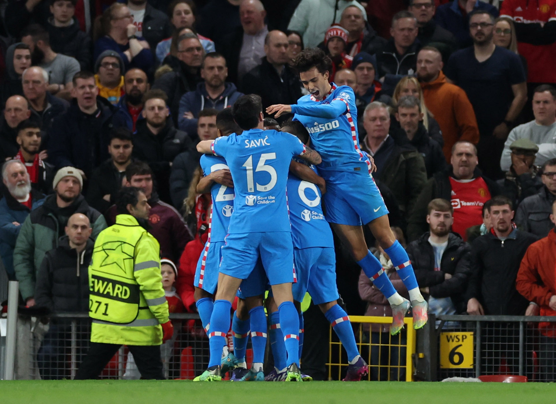 Soccer Football - Champions League - Round of 16 Second Leg - Manchester United v Atletico Madrid - Old Trafford, Manchester, Britain - March 15, 2022 Atletico Madrid's Renan Lodi celebrates scoring their first goal with teammates REUTERS