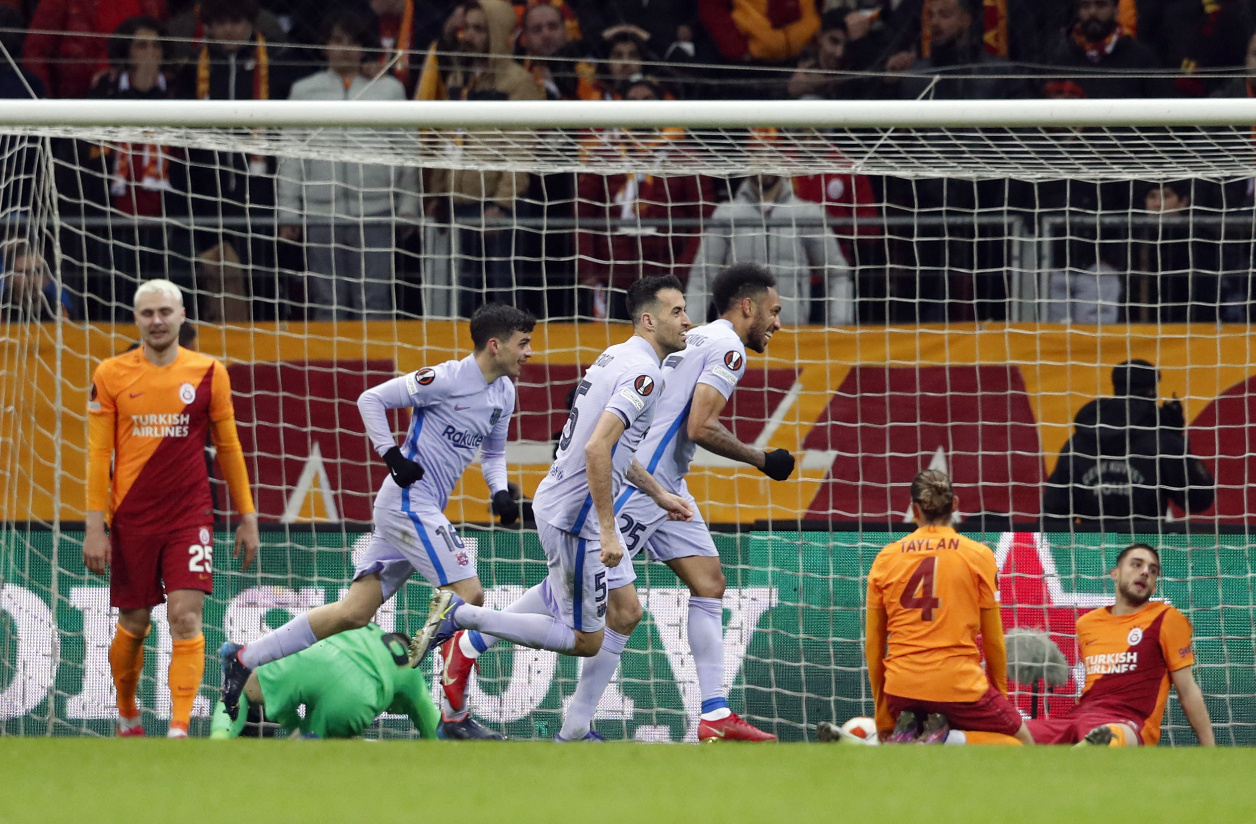 Soccer Football - Europa League - Round of 16 Second Leg - Galatasaray v FC Barcelona - Turk Telekom Stadium, Istanbul, Turkey - March 17, 2022  FC Barcelona's Pierre-Emerick Aubameyang celebrates scoring their second goal with Sergio Busquets and Pedri REUTERS