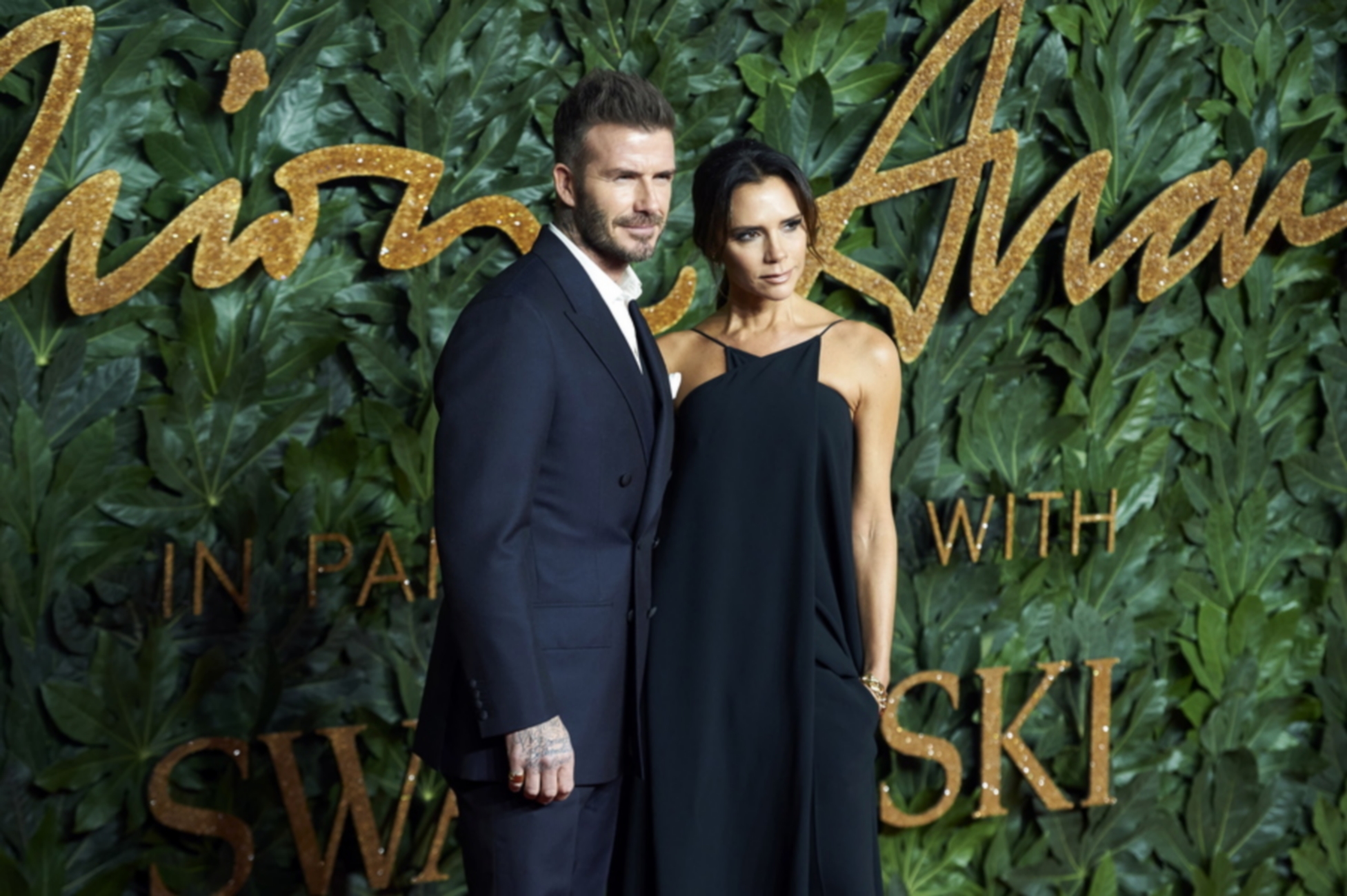 epa07222529 Former English international footballer David Beckham (L) and his wife fashion designer Victoria Beckham arrive for The Fashion Awards in London, Britain, 10 December 2018. The Fashion Awards is showcasing both British and international individuals and businesses who have made the most outstanding contributions to the fashion industry.  EPA
