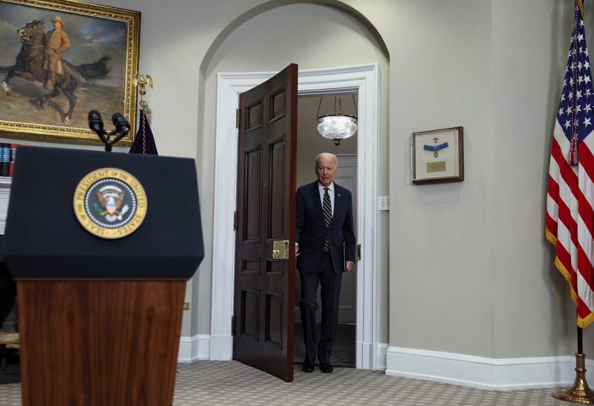 U.S. President Joe Biden enters the Roosevelt Room as he arrives prior to announcing new actions against Russia for its war on Ukraine, at the White House in Washington, U.S., March 11, 2022. REUTERS