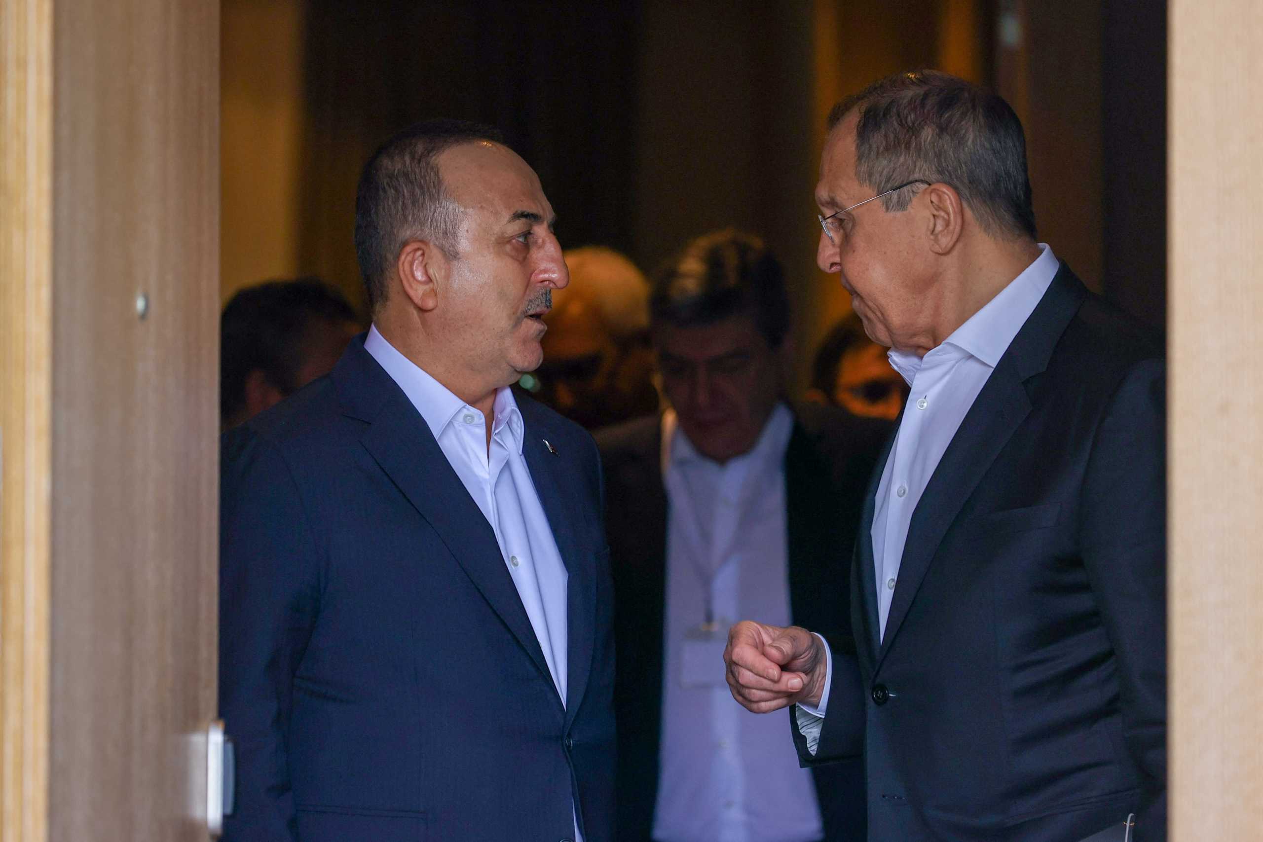 Turkish Foreign Minister Mevlut Cavusoglu talks to his Russian counterpart Sergei Lavrov during their meeting in Antalya, Turkey March 10, 2022. Russian Foreign Ministry