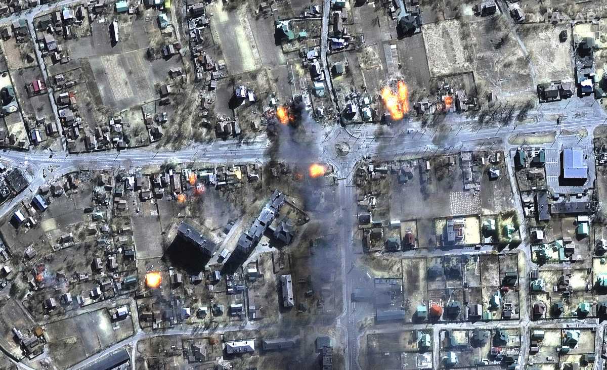 A satellite image shows a close up of burning homes and a residential area, northeast Chernihiv, Ukraine March 16, 2022. Satellite image ©2022 Maxar Technologies