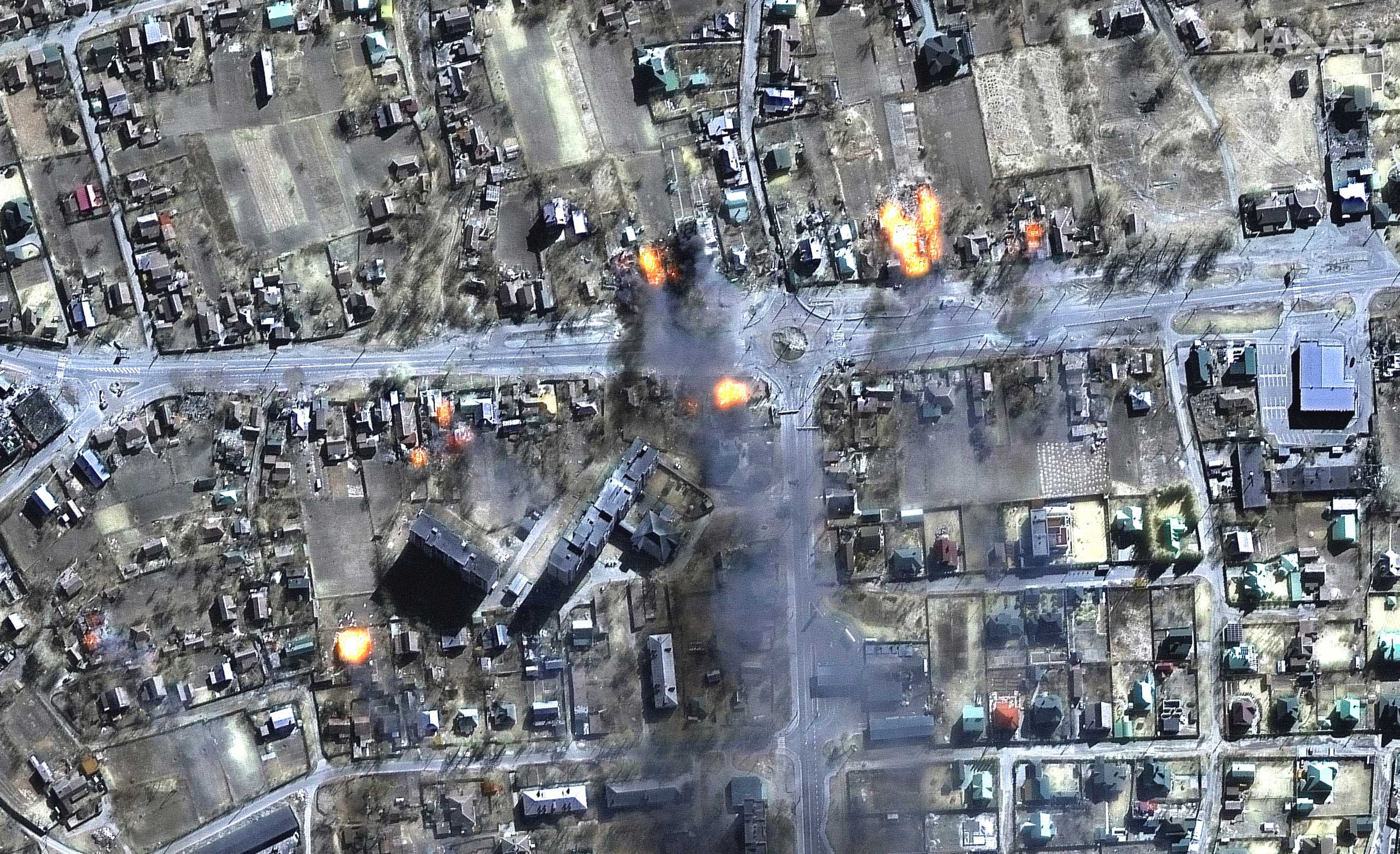 A satellite image shows a close up of burning homes and a residential area, northeast Chernihiv, Ukraine March 16, 2022. Satellite image ©2022 Maxar Technologies