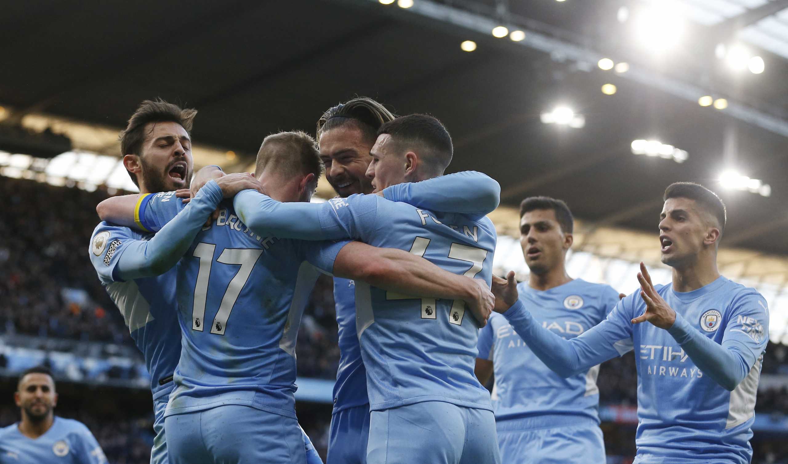 Soccer Football - Premier League - Manchester City v Manchester United - Etihad Stadium, Manchester, Britain - March 6, 2022 Manchester City's Kevin De Bruyne celebrates scoring their second goal with Bernardo Silva, Jack Grealish and Phil Foden REUTERS