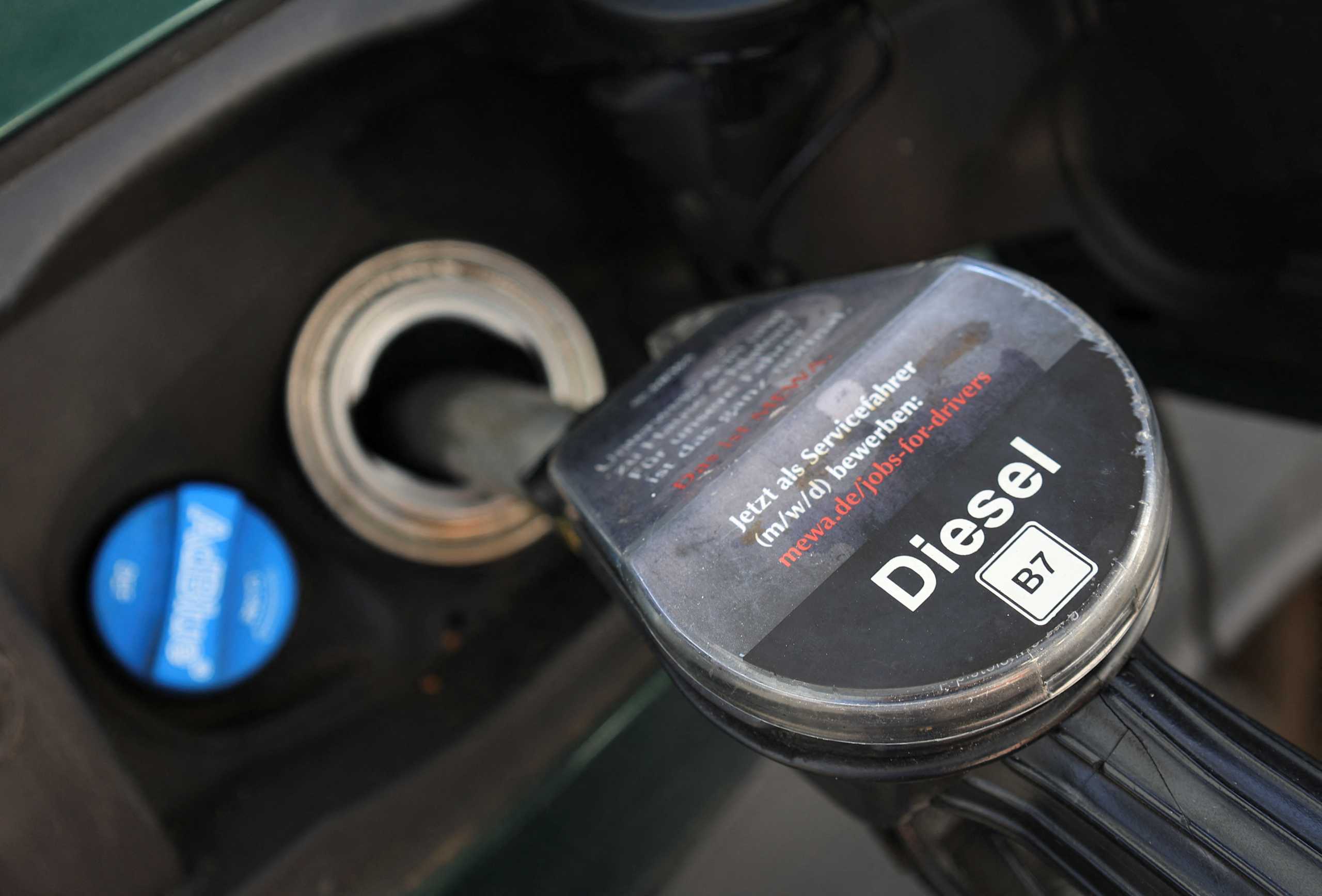 A diesel fuel nozzle is pictured during refuelling of a car, at a filling station, after Russia's invasion of Ukraine, in Bad Honnef near Bonn, Germany March 13, 2022. REUTERS