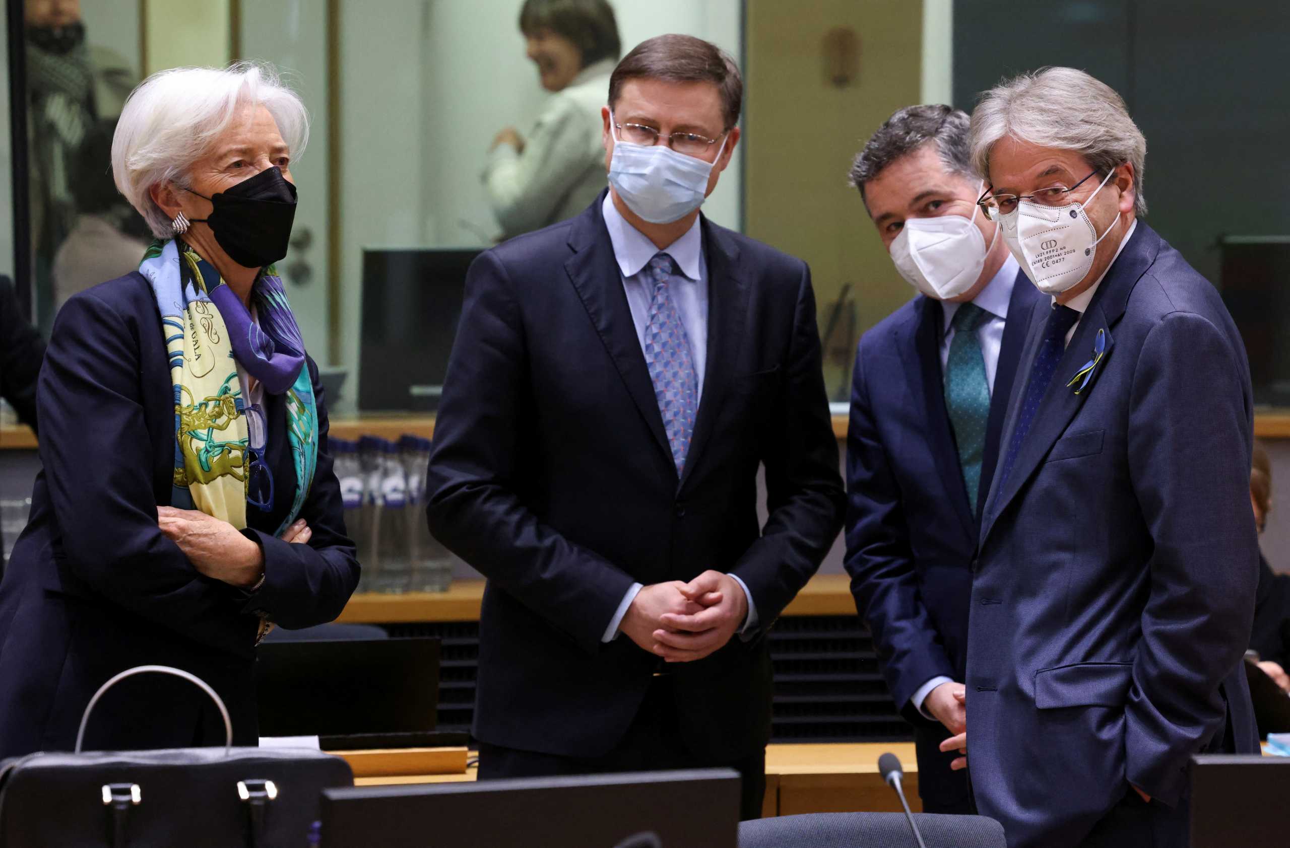 European Commissioner for Economy Paolo Gentiloni, European Commission Vice-President Valdis Dombrovskis, Finance Minister of Ireland and President of Eurogroup Paschal Donohoe and President of European Central Bank Christine Lagarde stand at the beginning of a Eurozone finance ministers meeting in Brussels, Belgium March 14, 2022. REUTERS