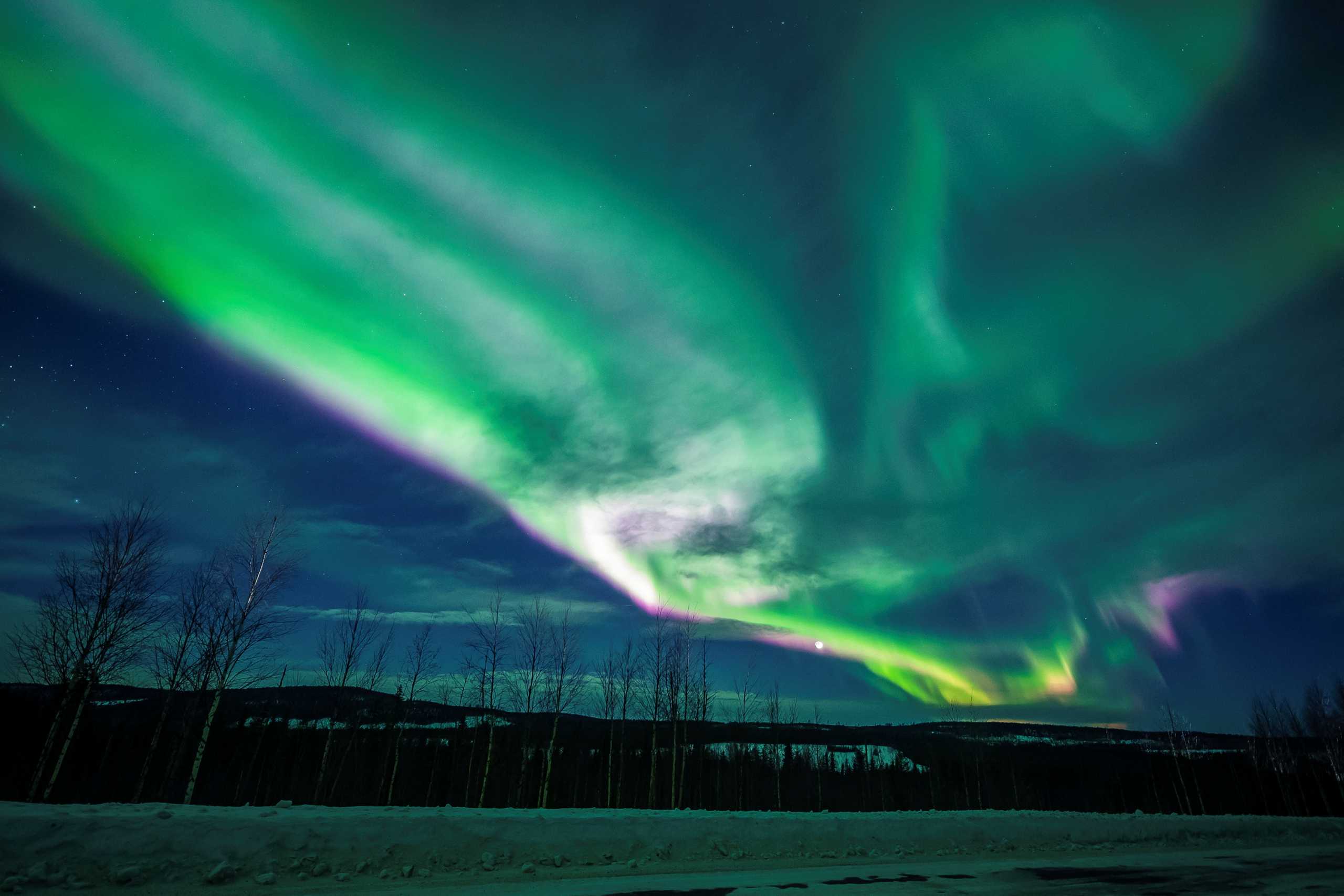 Northern lights, also called Aurora Borealis, is seen in the sky over Overkalix, Sweden March 5, 2022. Picture taken March 5, 2022. REUTERS