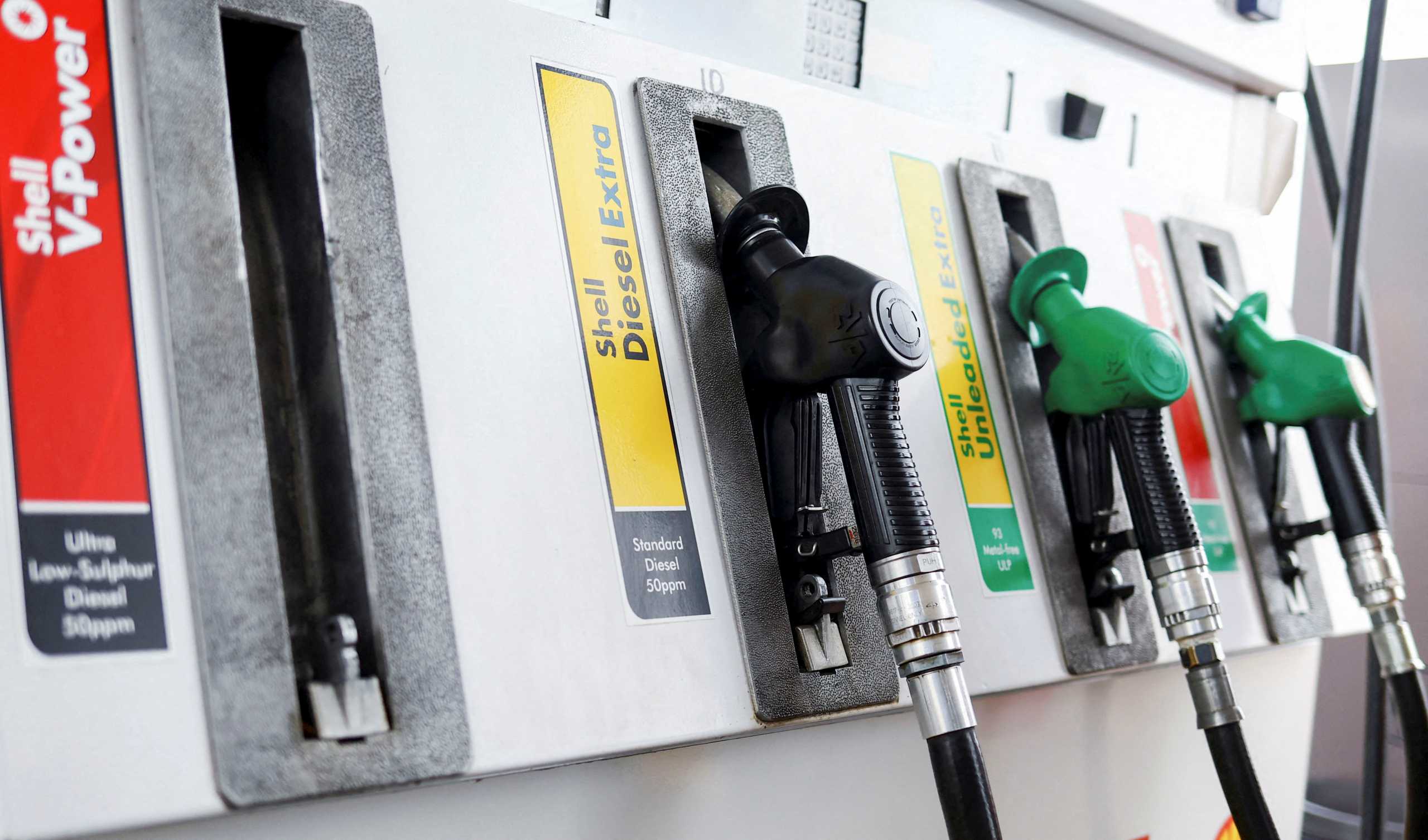 Fuel nozzles are seen at a fuel station in Johannesburg, South Africa, March 16, 2022. REUTERS
