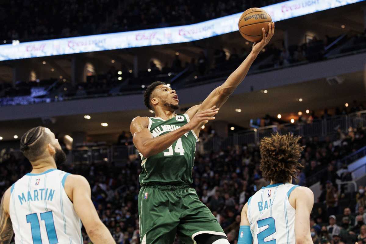Feb 28, 2022; Milwaukee, Wisconsin, USA;  Milwaukee Bucks forward Giannis Antetokounmpo (34) shoots during the first quarter against the Charlotte Hornets at Fiserv Forum. Mandatory Credit: Jeff Hanisch-USA TODAY Sports