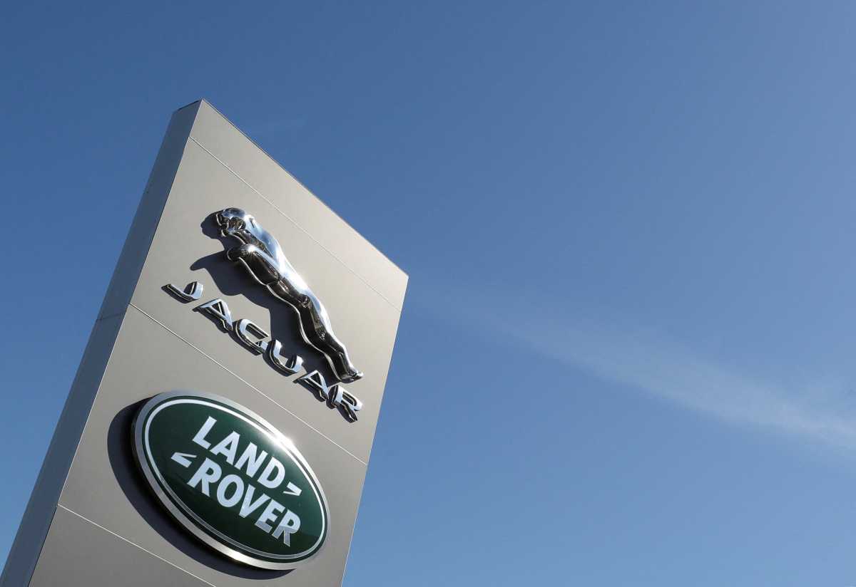 FILE PHOTO: Logos of Jaguar and Land-Rover are seen outside a car dealer in Brussels, Belgium May 28, 2020. REUTERS