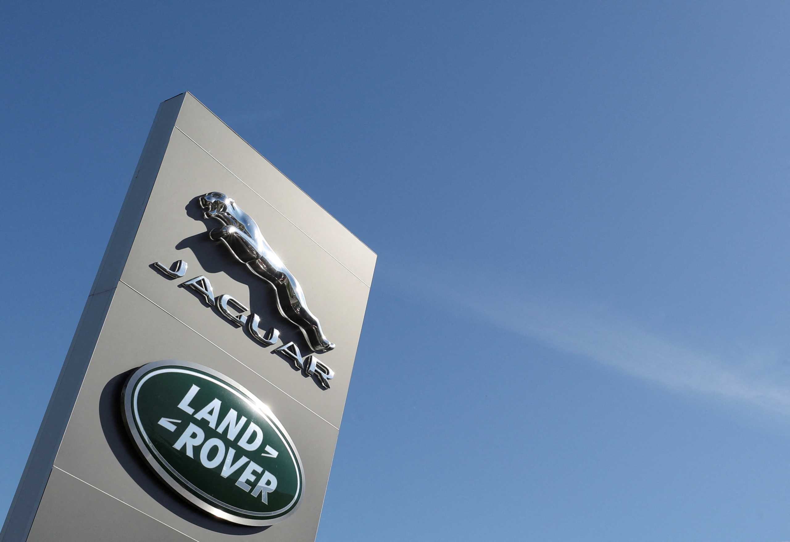 FILE PHOTO: Logos of Jaguar and Land-Rover are seen outside a car dealer in Brussels, Belgium May 28, 2020. REUTERS