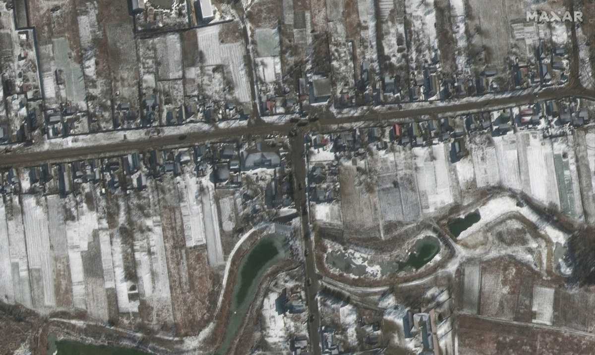 A satellite image shows troops and equipment deployed, amid Russia's ongoing invasion of Ukraine, in Ozera, northeast of Antonov Airport, Ukraine, March 10, 2022. Satellite image ©2022 Maxar Technologies
