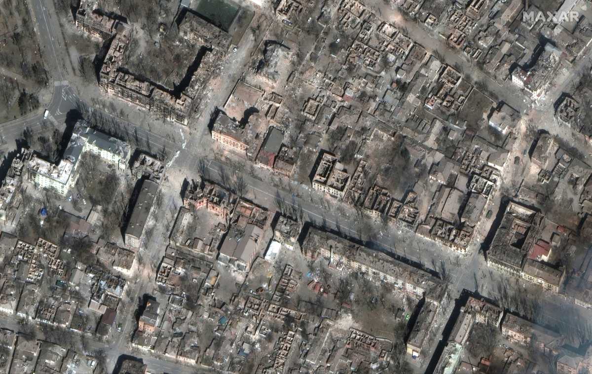 A satellite image shows destruction of homes and buildings, in Mariupol, Ukraine, March 29, 2022. Satellite image 2022 Maxar Technologies