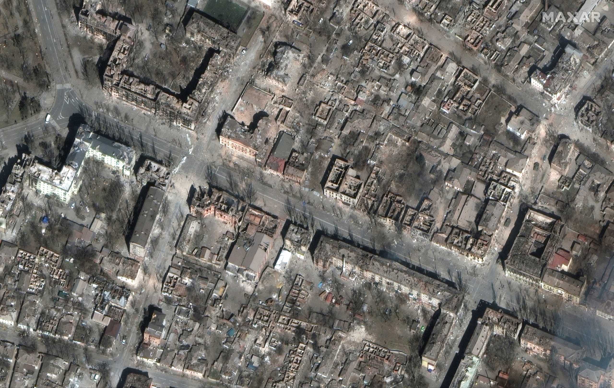 A satellite image shows destruction of homes and buildings, in Mariupol, Ukraine, March 29, 2022. Satellite image 2022 Maxar Technologies