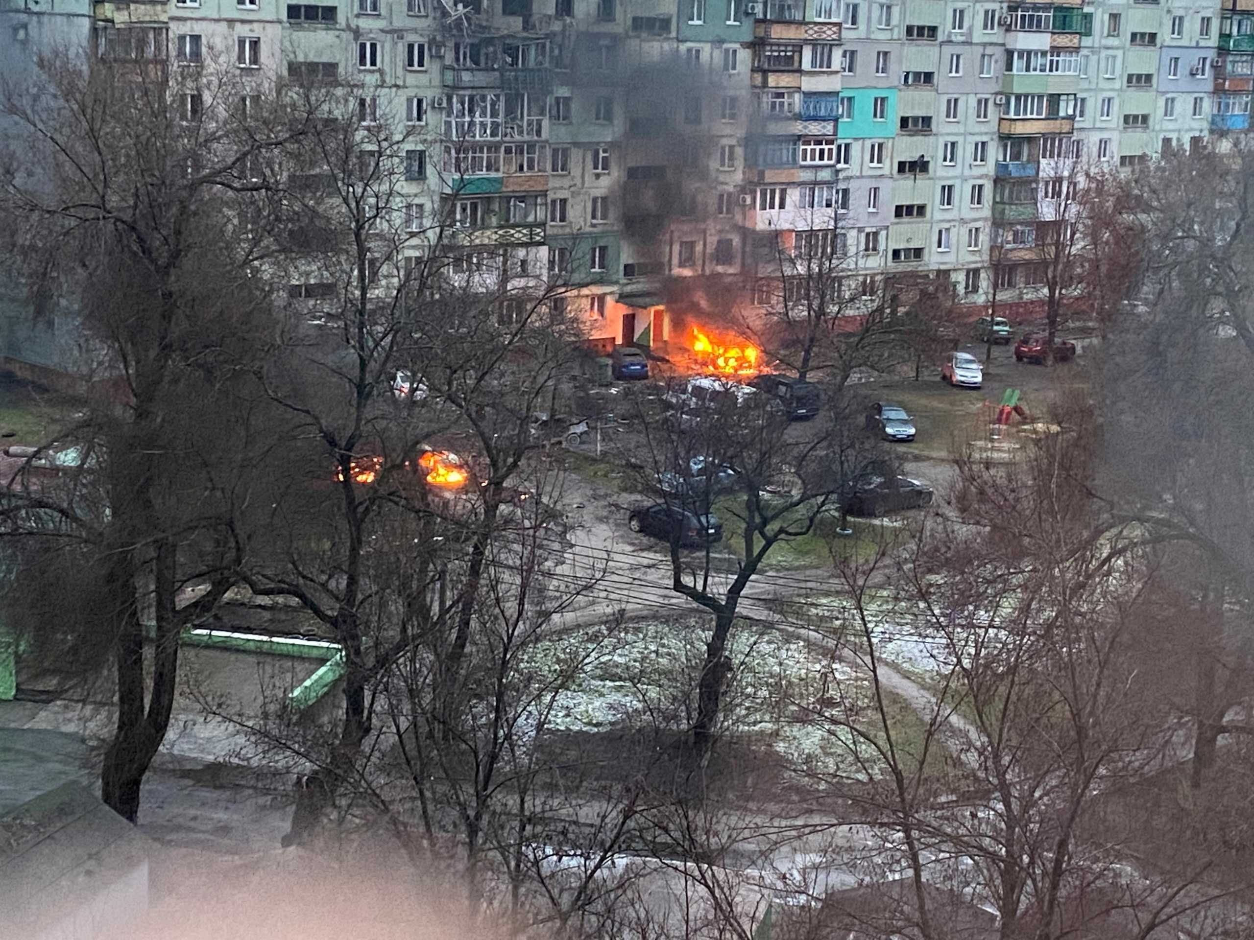 FILE PHOTO: Fire is seen in Mariupol at a residential area after shelling amid Russia's invasion of Ukraine March 3, 2022, in this image obtained from social media. Twitter @AyBurlachenko via REUTERS ATTENTION EDITORS - THIS IMAGE HAS BEEN SUPPLIED BY A THIRD PARTY. MANDATORY CREDIT