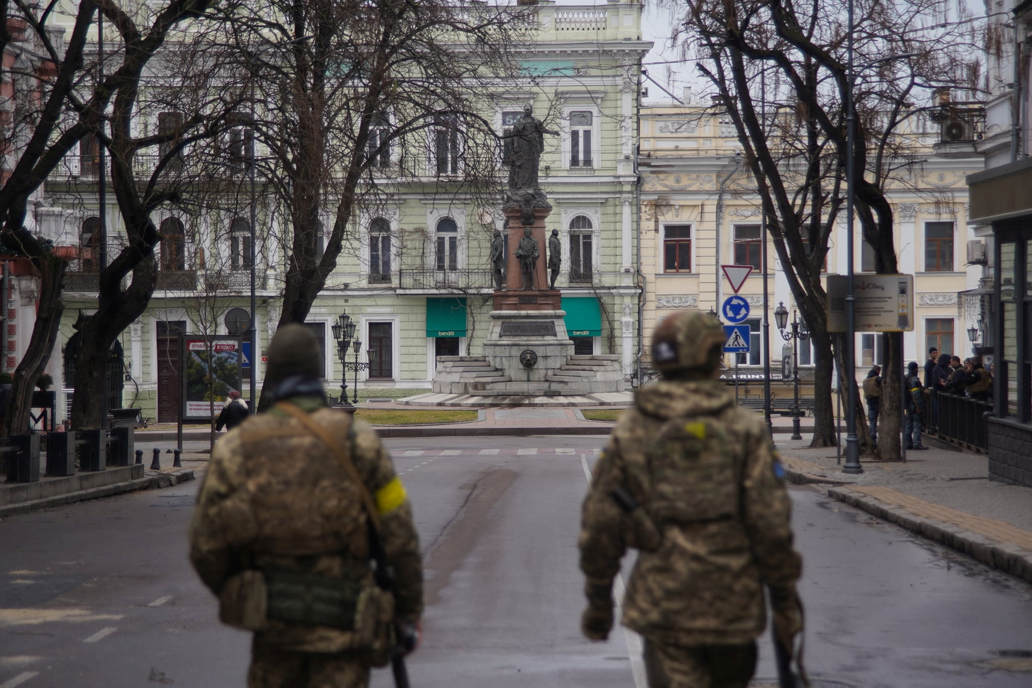 Members of Ukraine's Territorial Defence Forces patrol a street, amid the Russian invasion of Ukraine, in Odessa, Ukraine, in this handout picture released March 4, 2022. Press service of the 28th Separate Mechanised Brigade