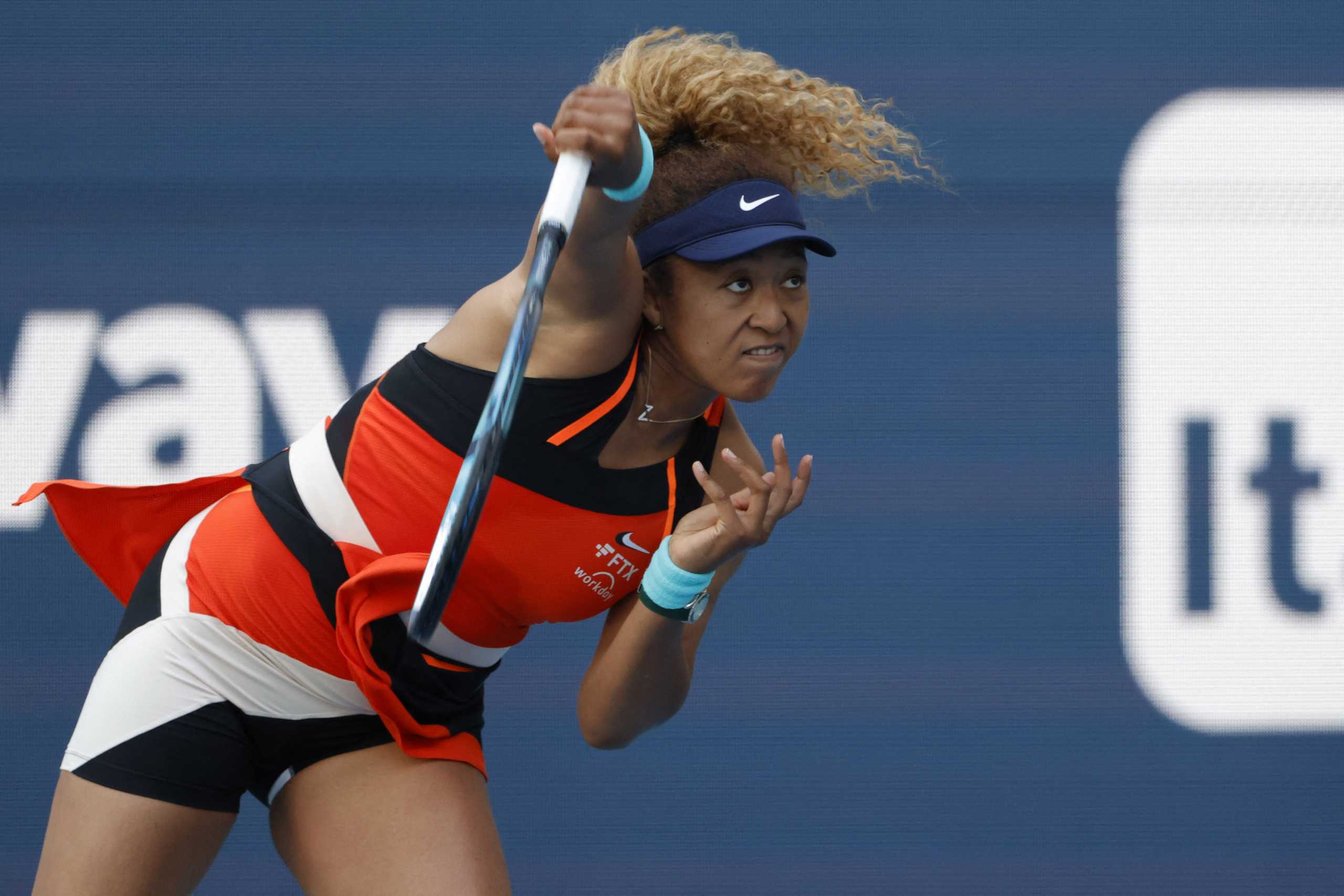 Mar 28, 2022; Miami Gardens, FL, USA; Naomi Osaka (JPN) serves against Alison Riske (USA)(not pictured) in a fourth round women's singles match in the Miami Open at Hard Rock Stadium. Mandatory Credit: Geoff Burke-USA TODAY Sports