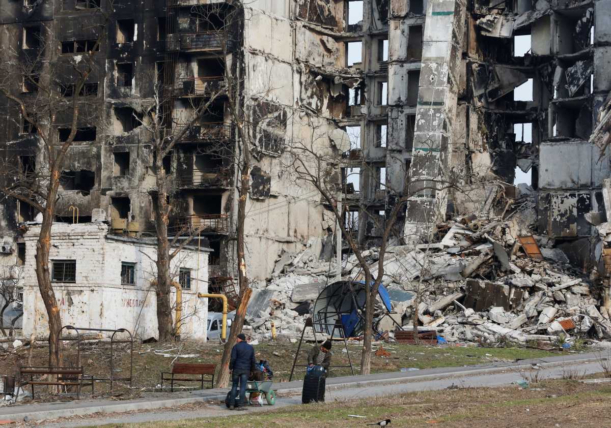 A view shows an apartment building destroyed during Ukraine-Russia conflict in the besieged southern port city of Mariupol, Ukraine March 30, 2022. REUTERS