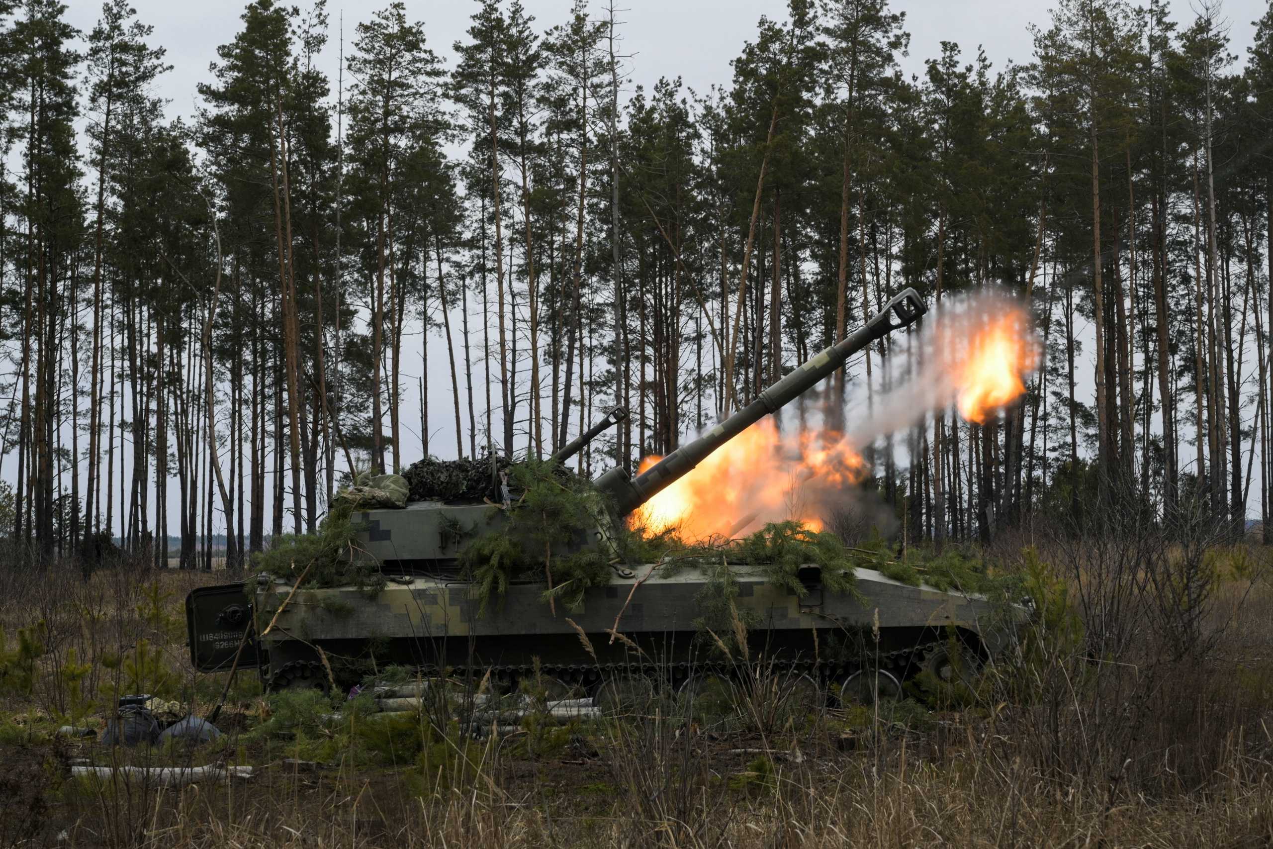 Ukrainian armed forces self-propelled howitzers fire at positions following Russia's invasion of Ukraine, near the settlement of Makariv, Ukraine March 6, 2022. REUTERS