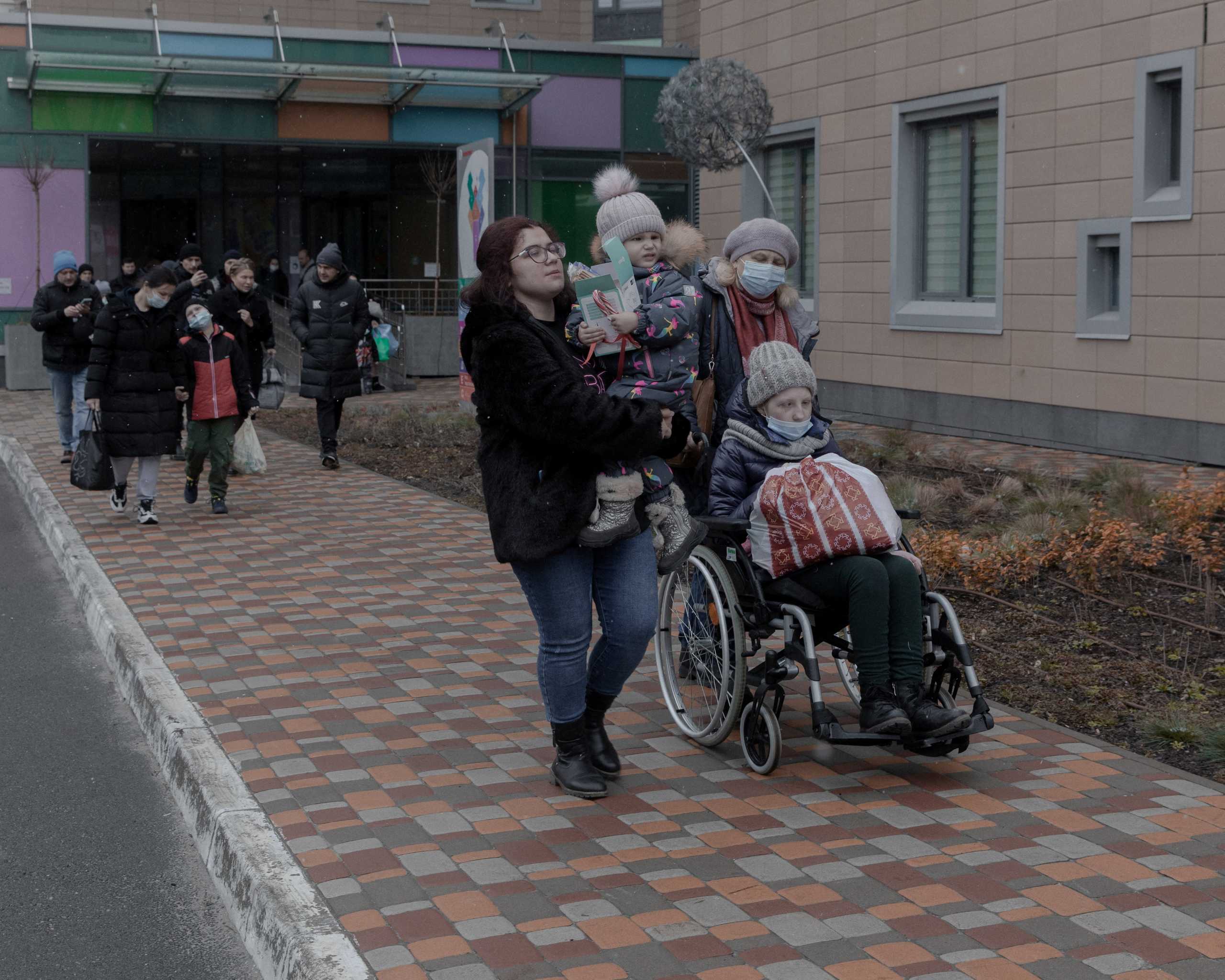 Patients of Ohmatdyt Children's Hospital are taken to a bus headed to Poland, as Russia's invasion of Ukraine continues, in Kyiv, Ukraine March 2, 2022. Jedrzej Nowicki