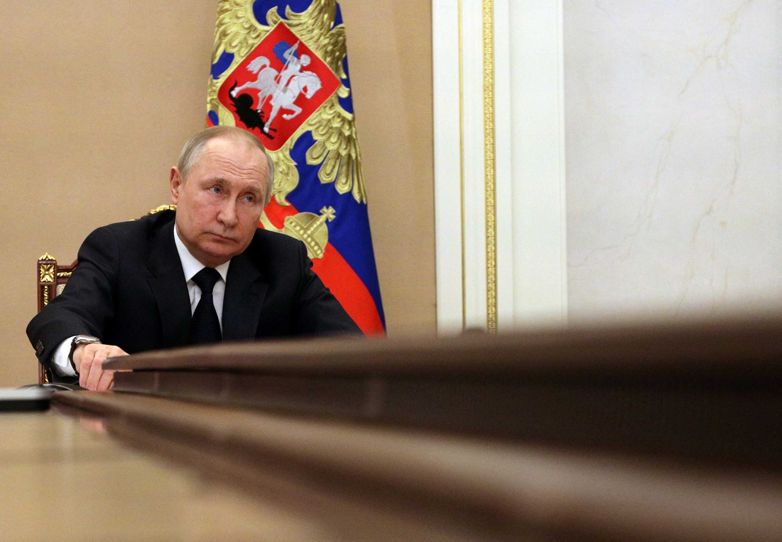 Russian President Vladimir Putin attends a meeting with government members via a video link in Moscow, Russia March 10, 2022. Sputnik